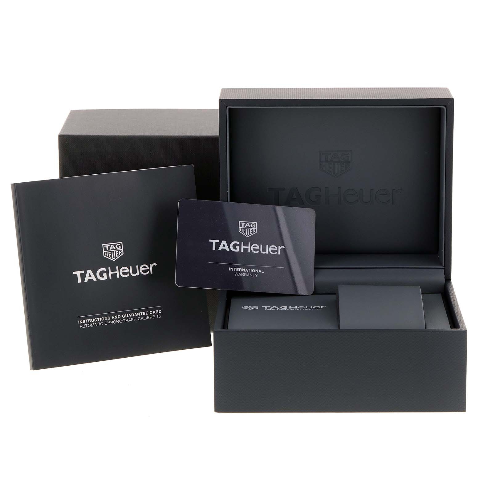 The image shows the packaging, warranty card, and instruction manual for a Tag Heuer Carrera CBK2112.BA0715 Men
s Stainless Steel Blue Dial CBK2112.BA0715 Men
s Stainless Steel Blue Dial watch.