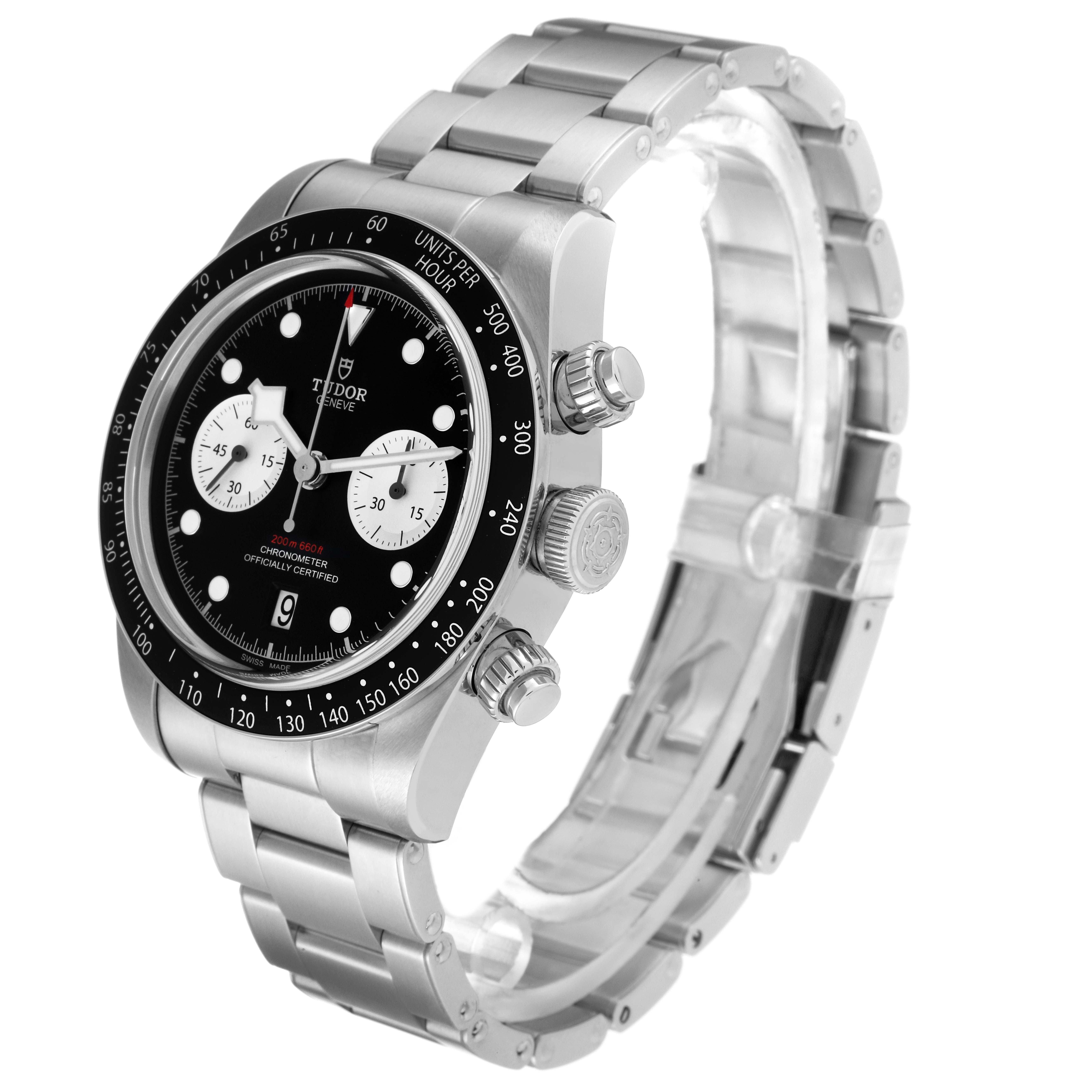 The image shows a Tudor Heritage Black Bay watch from an angled side view, displaying its dial, case, and metal bracelet.