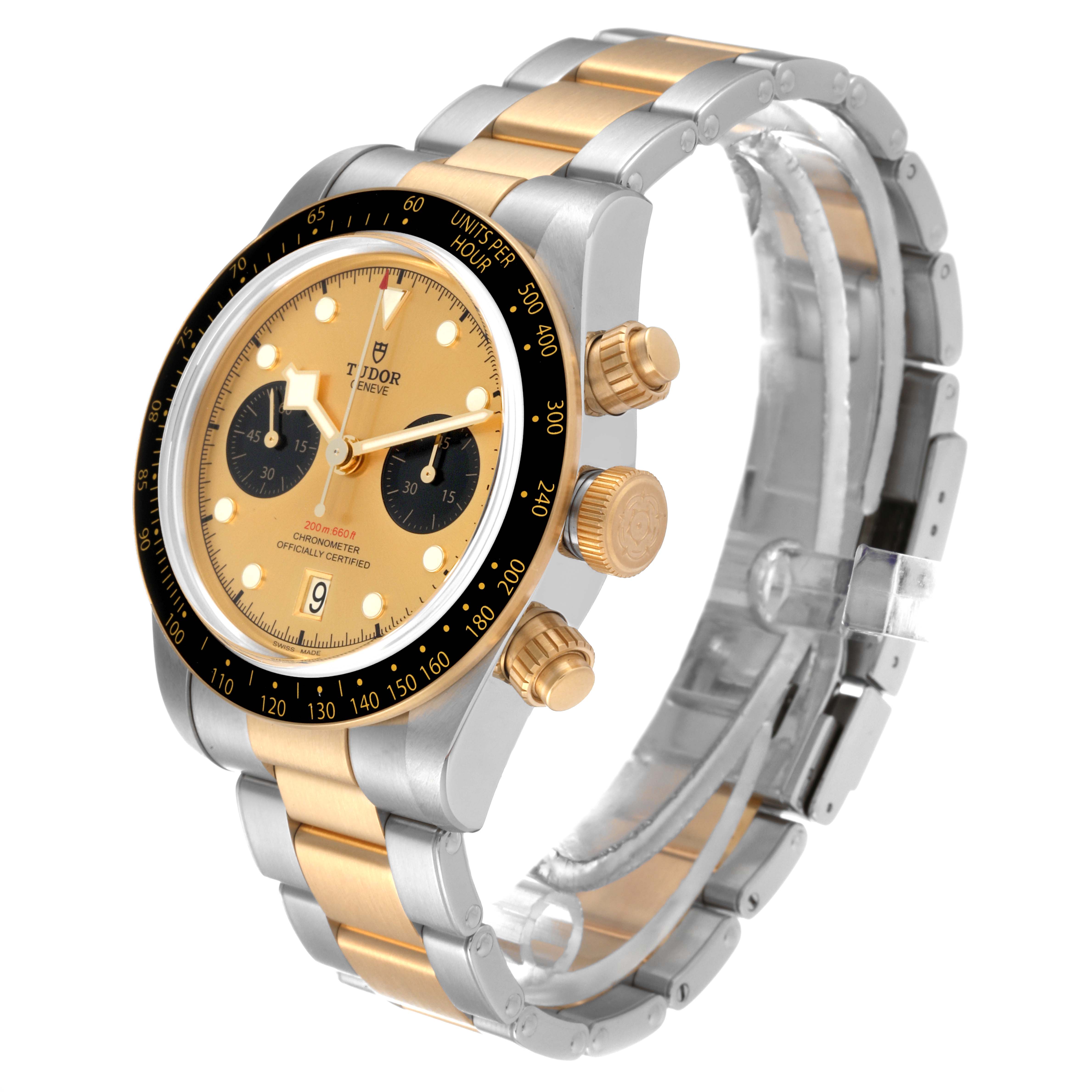 The Tudor Heritage Black Bay 79363 Men's Steel and Gold (two tone) Champagne Dial 79363 Men's Steel and Gold (two tone) Champagne Dial watch is shown from an angled view, displaying its face, bracelet, and side buttons.