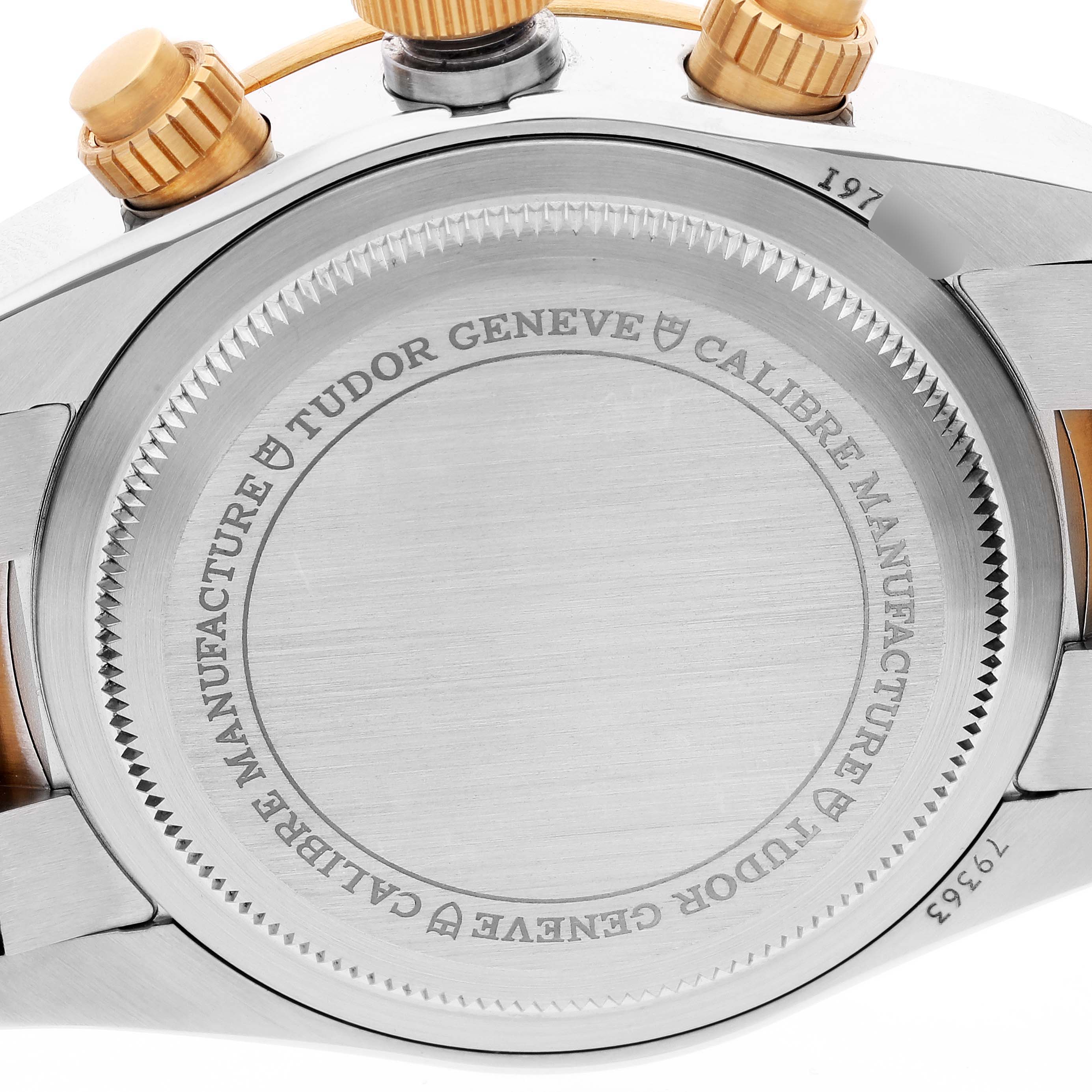 The image shows the case back, crown, and pushers of the Tudor Heritage Black Bay 79363N Men's Steel and Gold (two tone) Black Dial 79363N Men's Steel and Gold (two tone) Black Dial watch.