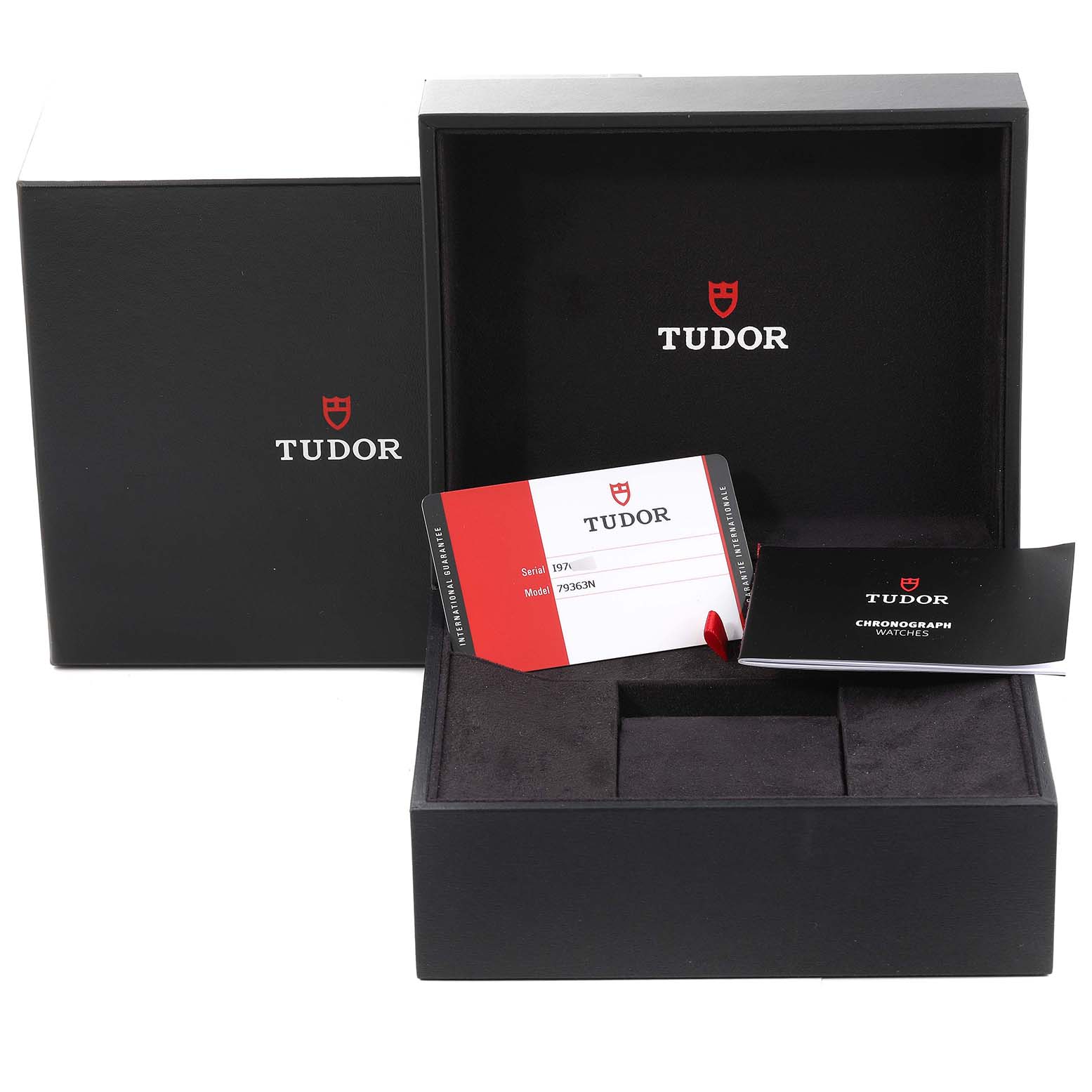 This image shows the Tudor Heritage Black Bay 79363N Men's Steel and Gold (two tone) Black Dial 79363N Men's Steel and Gold (two tone) Black Dial watch box, warranty card, and manual from a top and frontal angle.