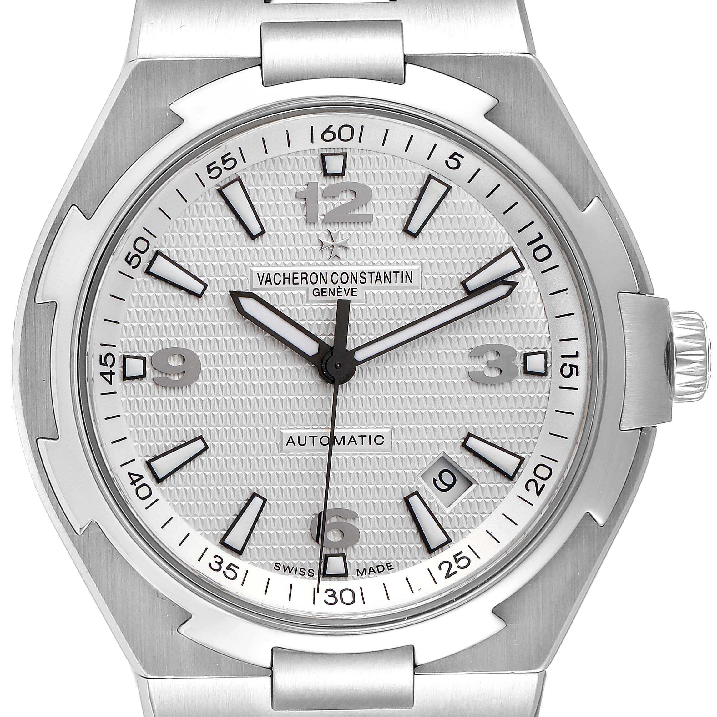 The image displays the face of the Vacheron Constantin Overseas 47040B01A-9093 Men's Stainless Steel Silver Dial 47040B01A-9093 Men's Stainless Steel Silver Dial watch, showing the dial, markers, hands, and a portion of the bracelet.