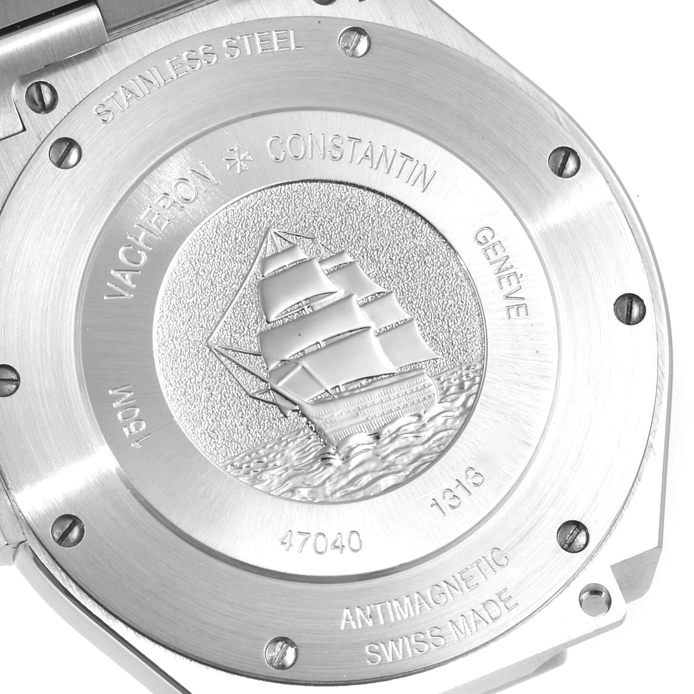 The image shows the back case of a Vacheron Constantin Overseas 47040B01A-9093 Men's Stainless Steel Silver Dial 47040B01A-9093 Men's Stainless Steel Silver Dial model watch, featuring a ship engraving.