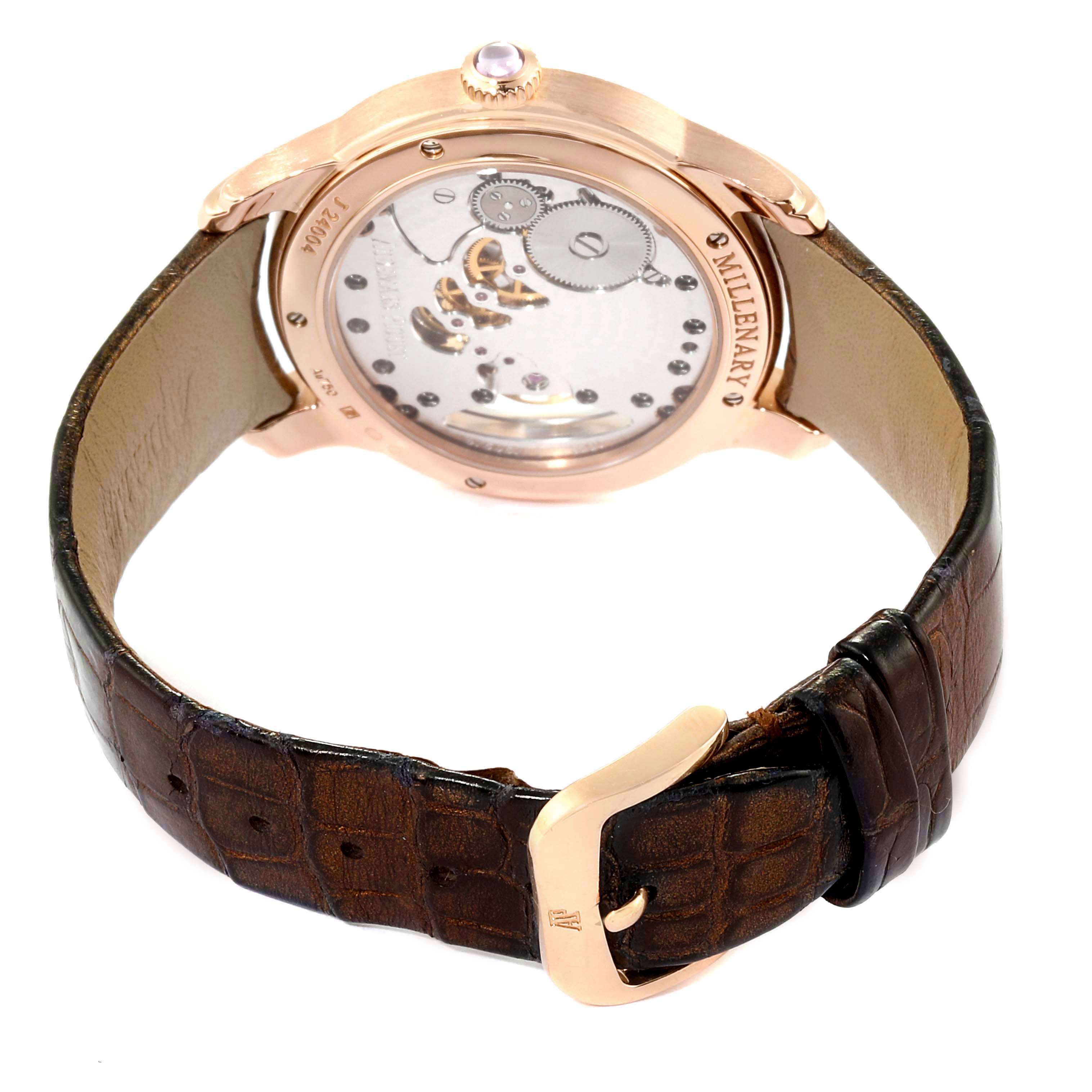The image shows the back view of the Audemars Piguet Millenary 77247OR.ZZ.1272OR.01 Women's Rose Gold Mother of Pearl Dial 77247OR.ZZ.1272OR.01 Women's Rose Gold Mother of Pearl Dial watch, highlighting its mechanical movement and brown leather strap.
