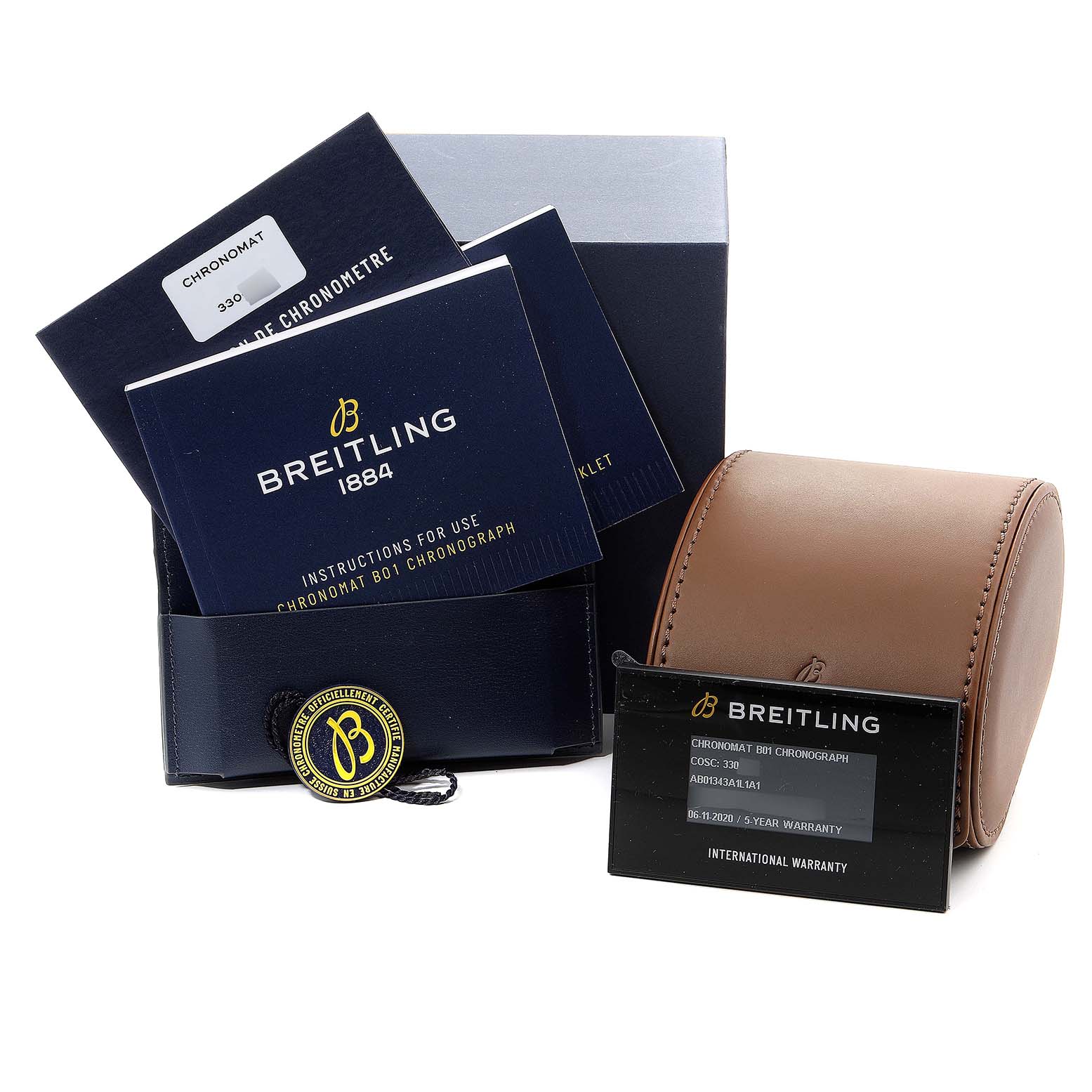 The image shows the accessories for a Breitling Chronomat AB01343A1L1A1 Men's Stainless Steel Green Dial AB01343A1L1A1 Men's Stainless Steel Green Dial watch, including manuals, warranty cards, a carrying case, and packaging.