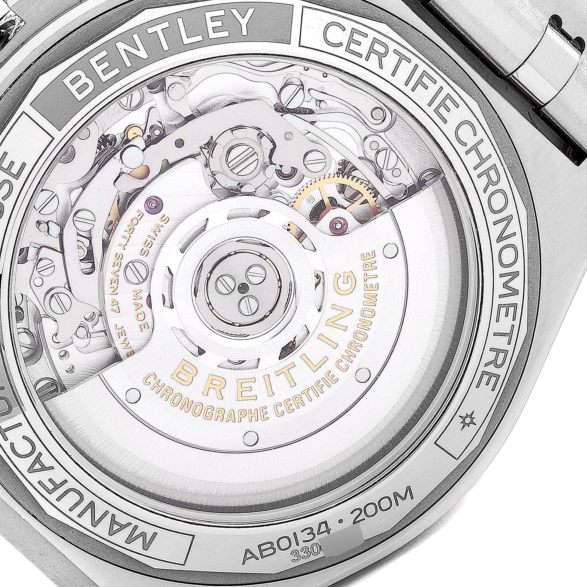 This is a close-up view of the back of a Breitling Chronomat AB01343A1L1A1 Men's Stainless Steel Green Dial AB01343A1L1A1 Men's Stainless Steel Green Dial watch, showing the intricate inner mechanisms and branding details.