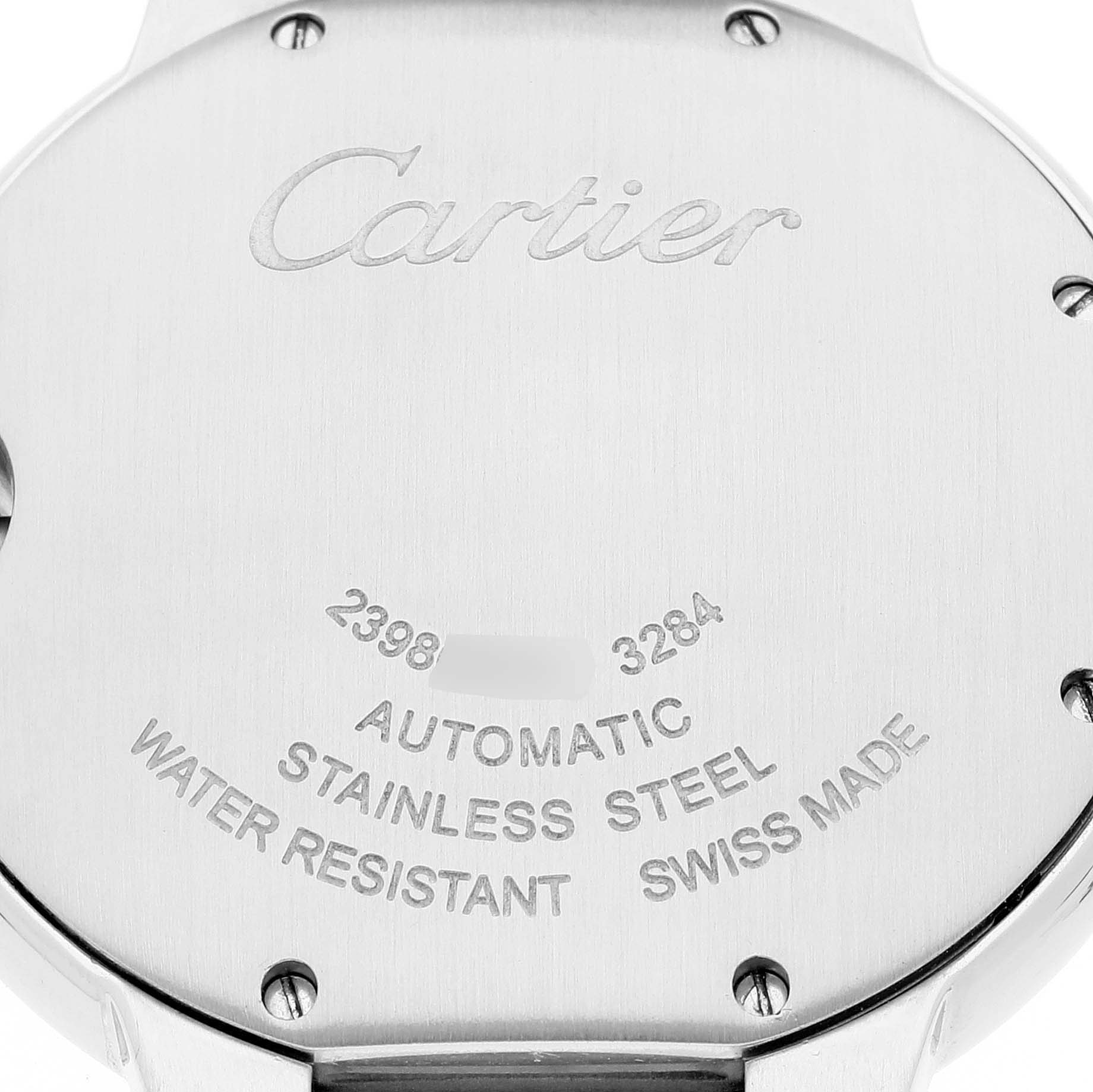This image shows the back side of a Cartier Ballon Bleu W6920047 Women's Steel and Gold (two tone) Silver Dial W6920047 Women's Steel and Gold (two tone) Silver Dial watch, highlighting its stainless steel case and inscriptions.