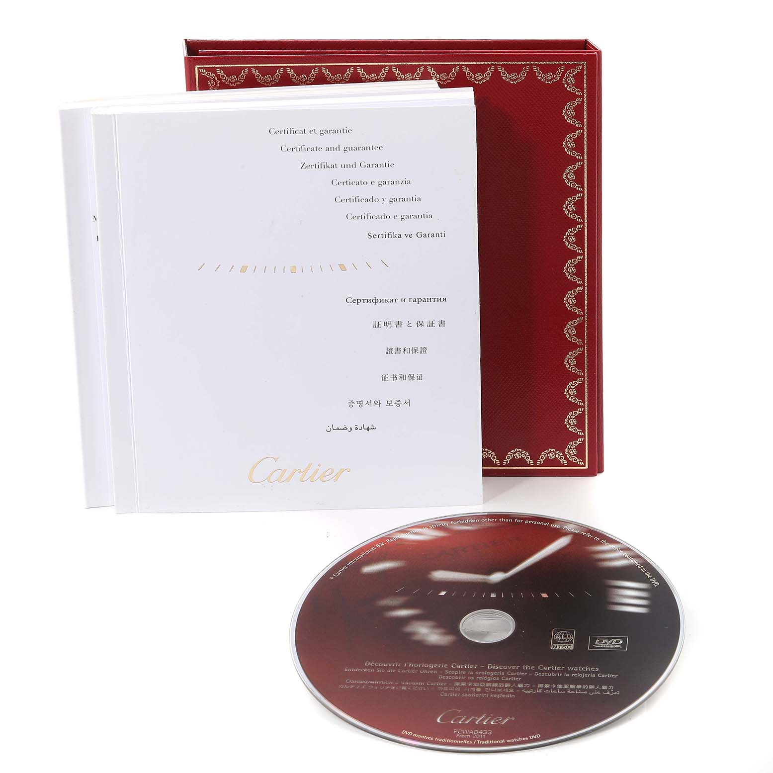 The image shows the warranty book, red-box packaging, and DVD for the Ballon Bleu model by Cartier.