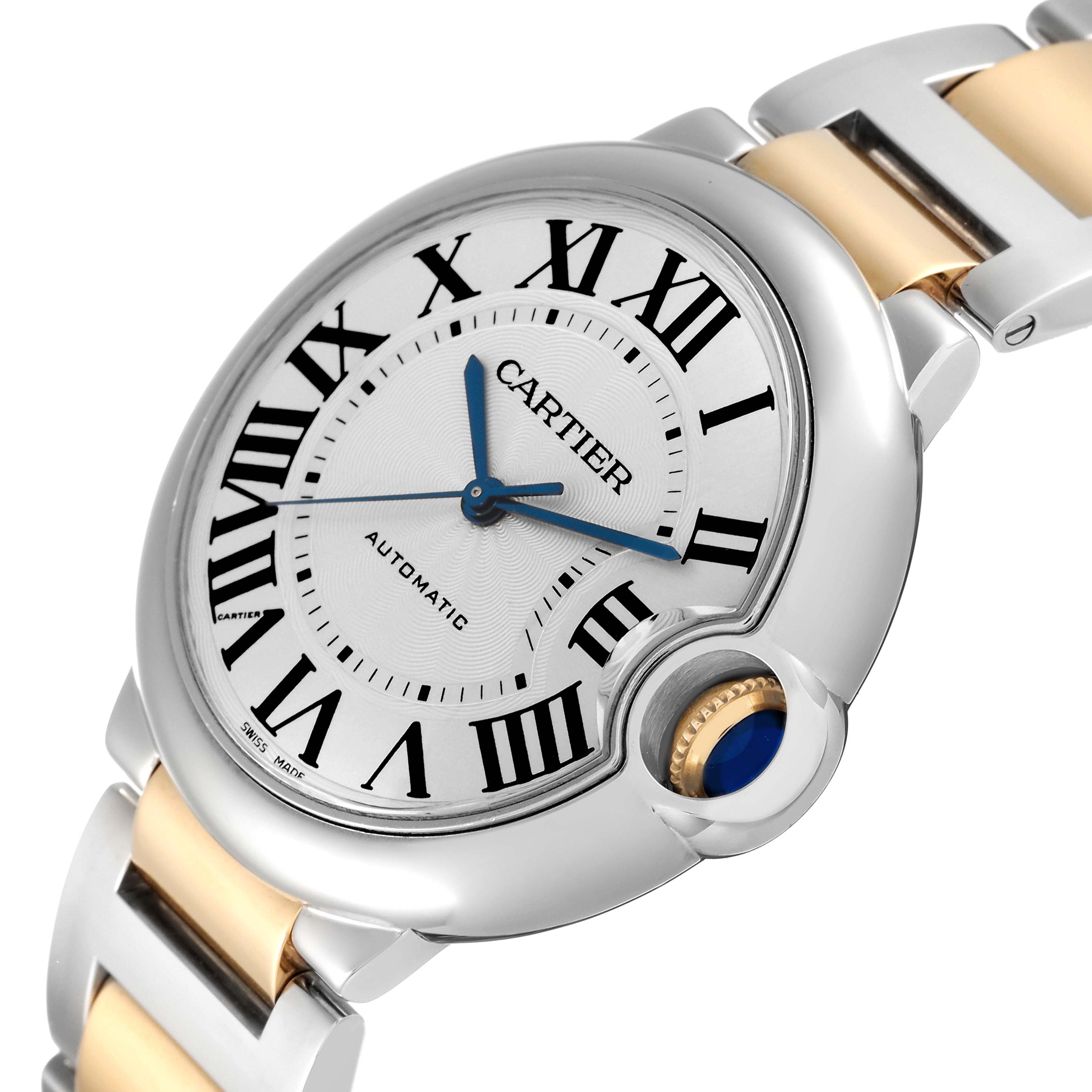This image shows a close-up angled view of the Cartier Ballon Bleu W6920047 Women's Steel and Gold (two tone) Silver Dial W6920047 Women's Steel and Gold (two tone) Silver Dial watch, featuring its dial, crown, and part of the bracelet.
