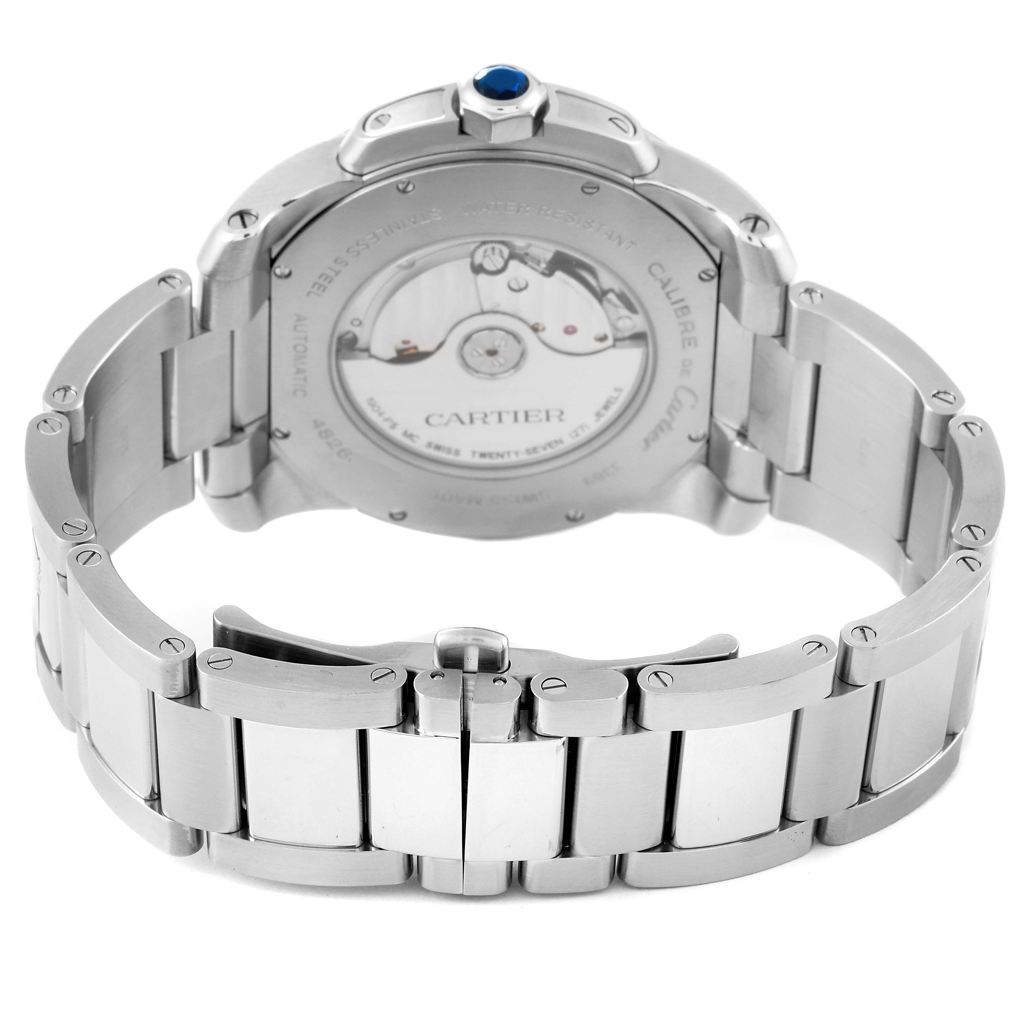 The image shows the back view of a Calibre de Cartier watch by Cartier, highlighting its stainless steel bracelet and automatic movement.