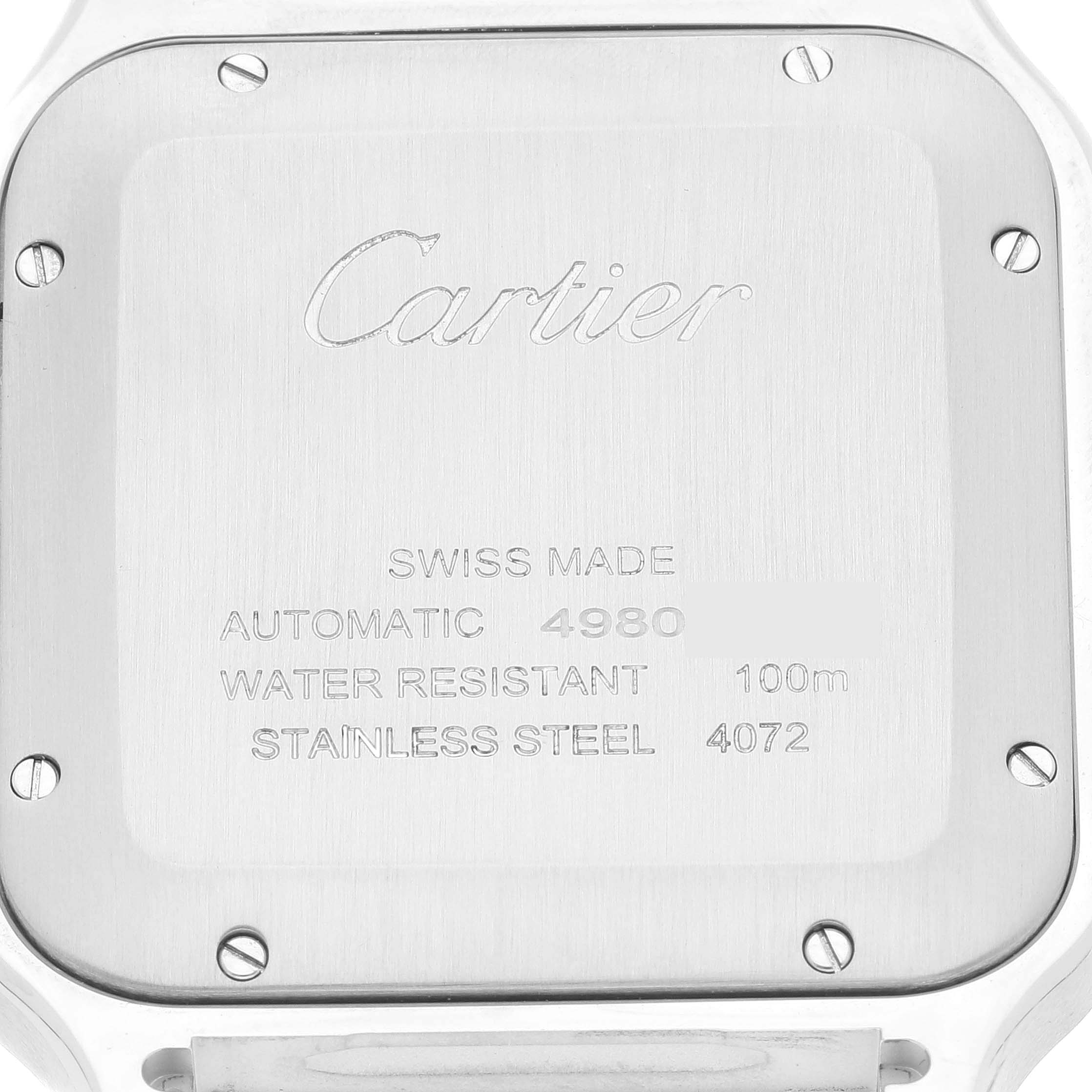 This image shows the back case of a Santos model watch by Cartier, highlighting its specifications and branding.