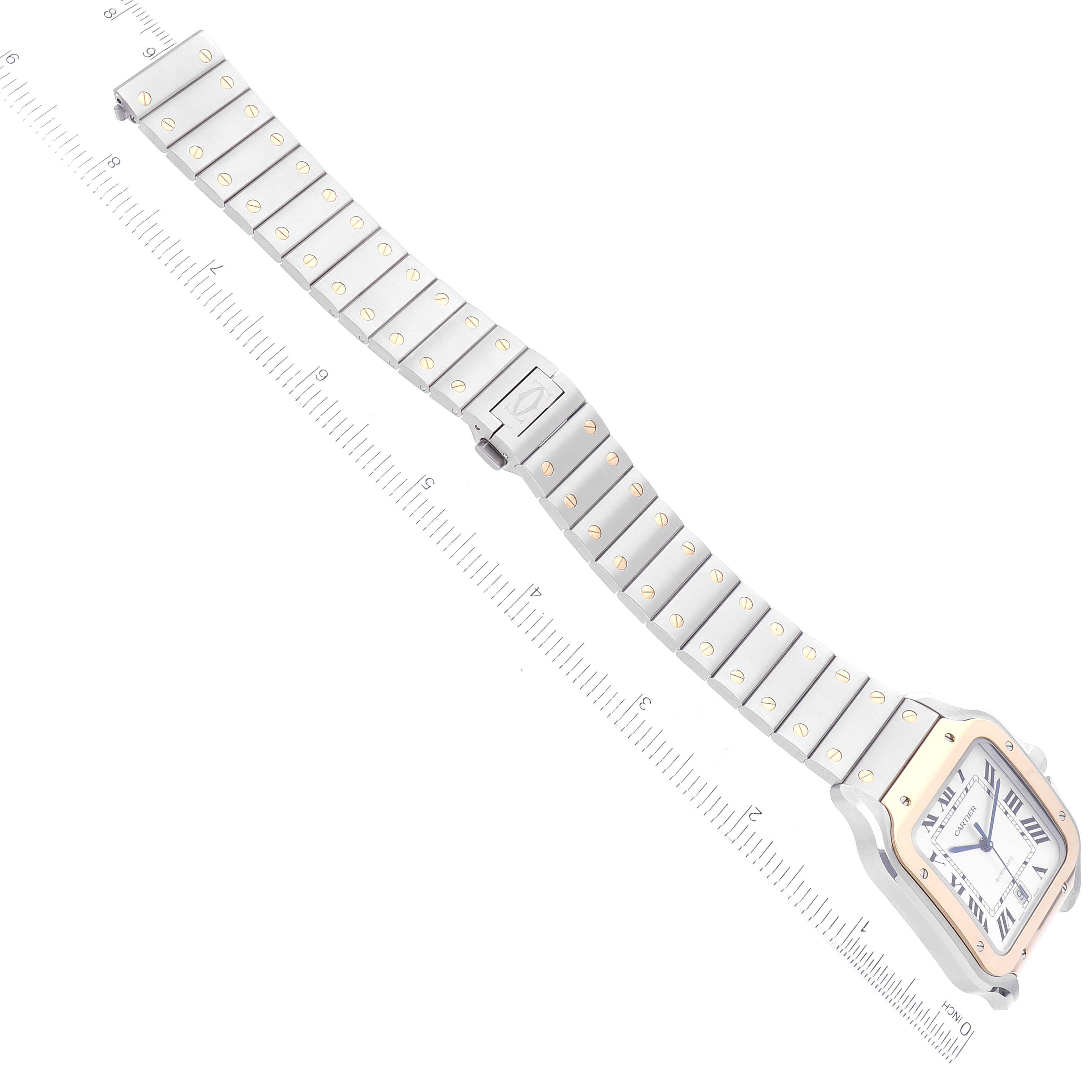 The image shows a Santos model Cartier watch laid flat with the face and entire bracelet visible.