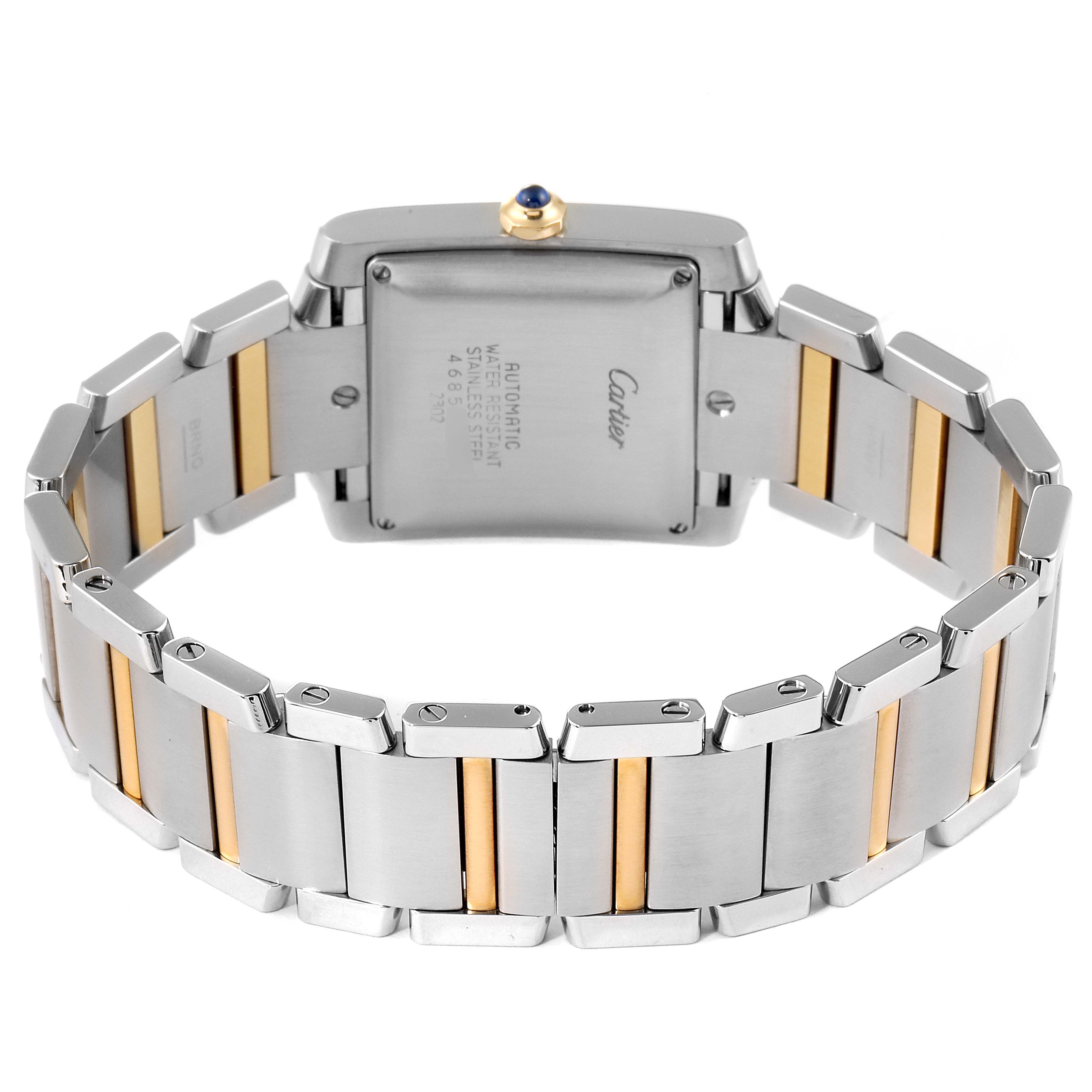 The image shows the back view of a Cartier Tank Française watch, highlighting its case back and two-tone bracelet.