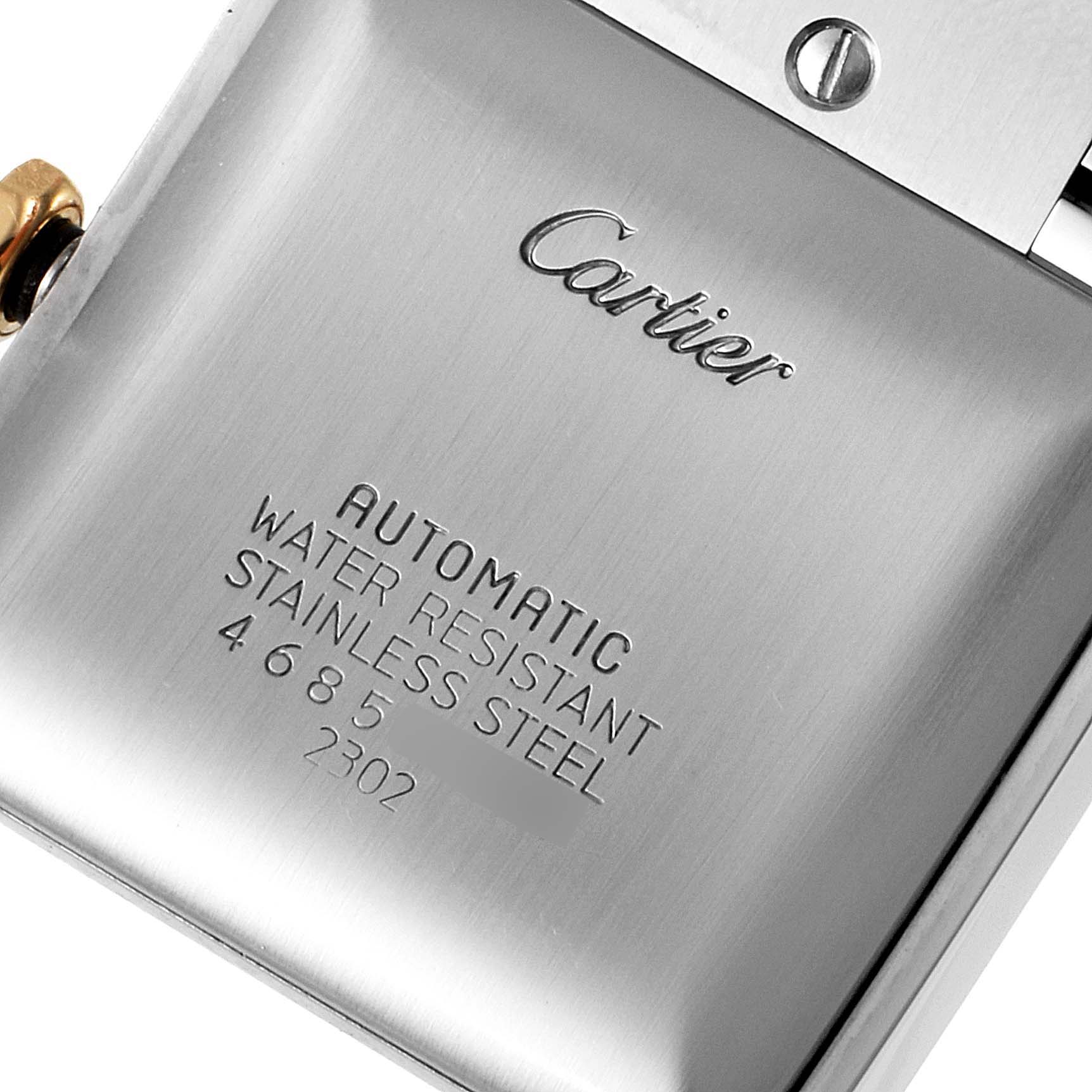 The image shows the back case of a Cartier Tank Française watch, highlighting its branding and specifications.