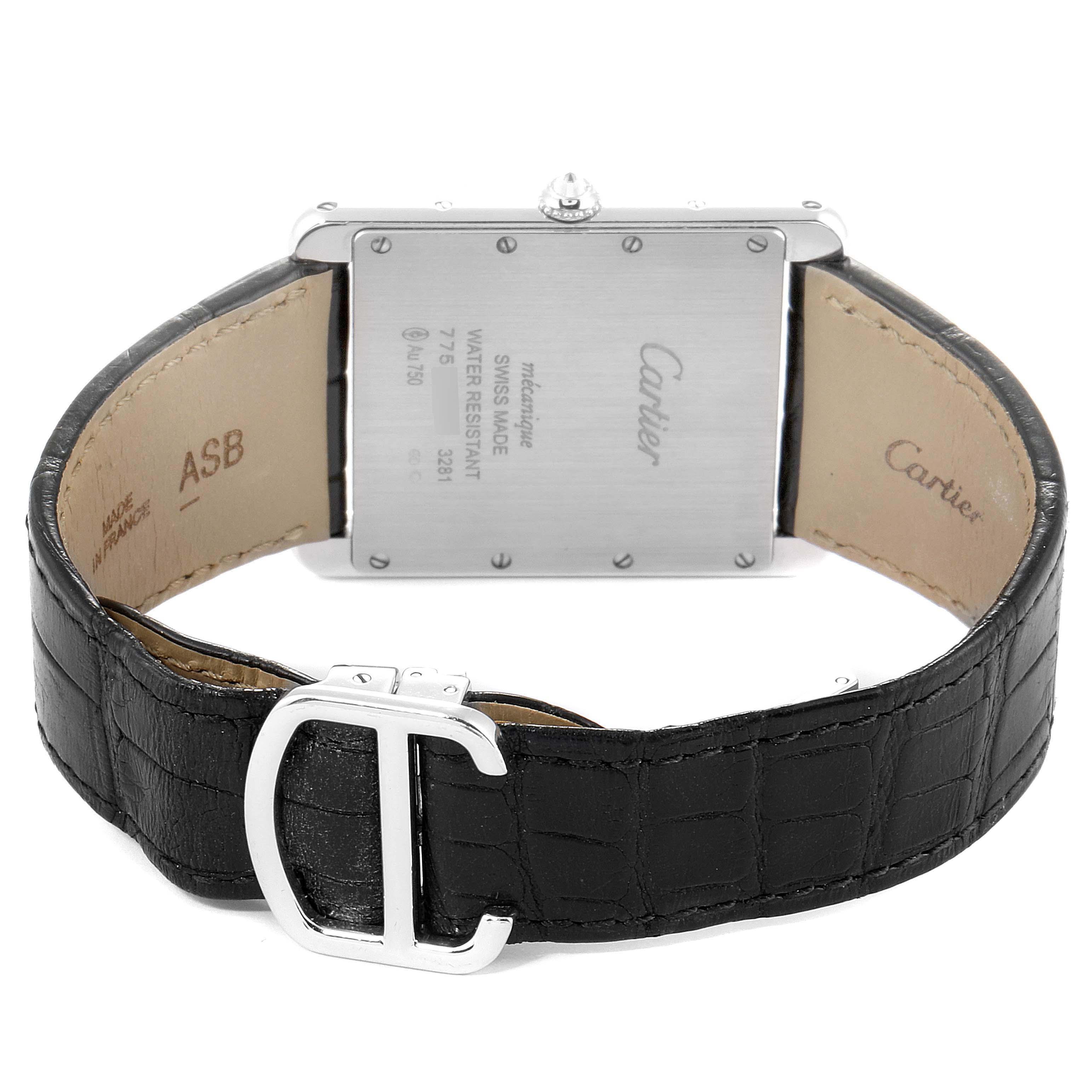 The image shows the back view of a Cartier Tank Louis WT200006 Men's White Gold Silver Dial WT200006 Men's White Gold Silver Dial watch, displaying its case back and leather strap with clasp.