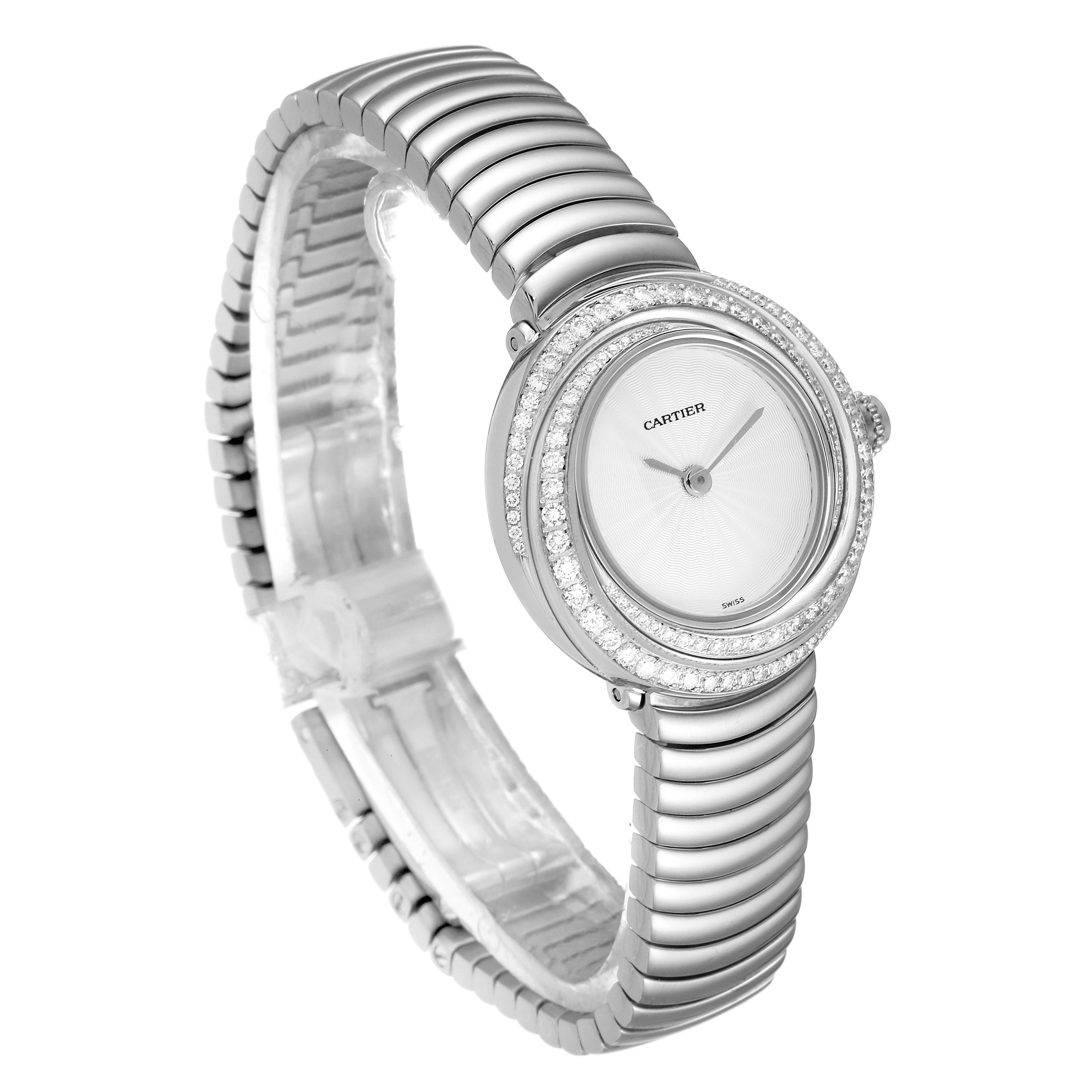 This image showcases a Cartier Trinity 2444 Women's White Gold Silver Dial 2444 Women's White Gold Silver Dial model watch angled diagonally, highlighting its round face, diamond bezel, and metal bracelet.