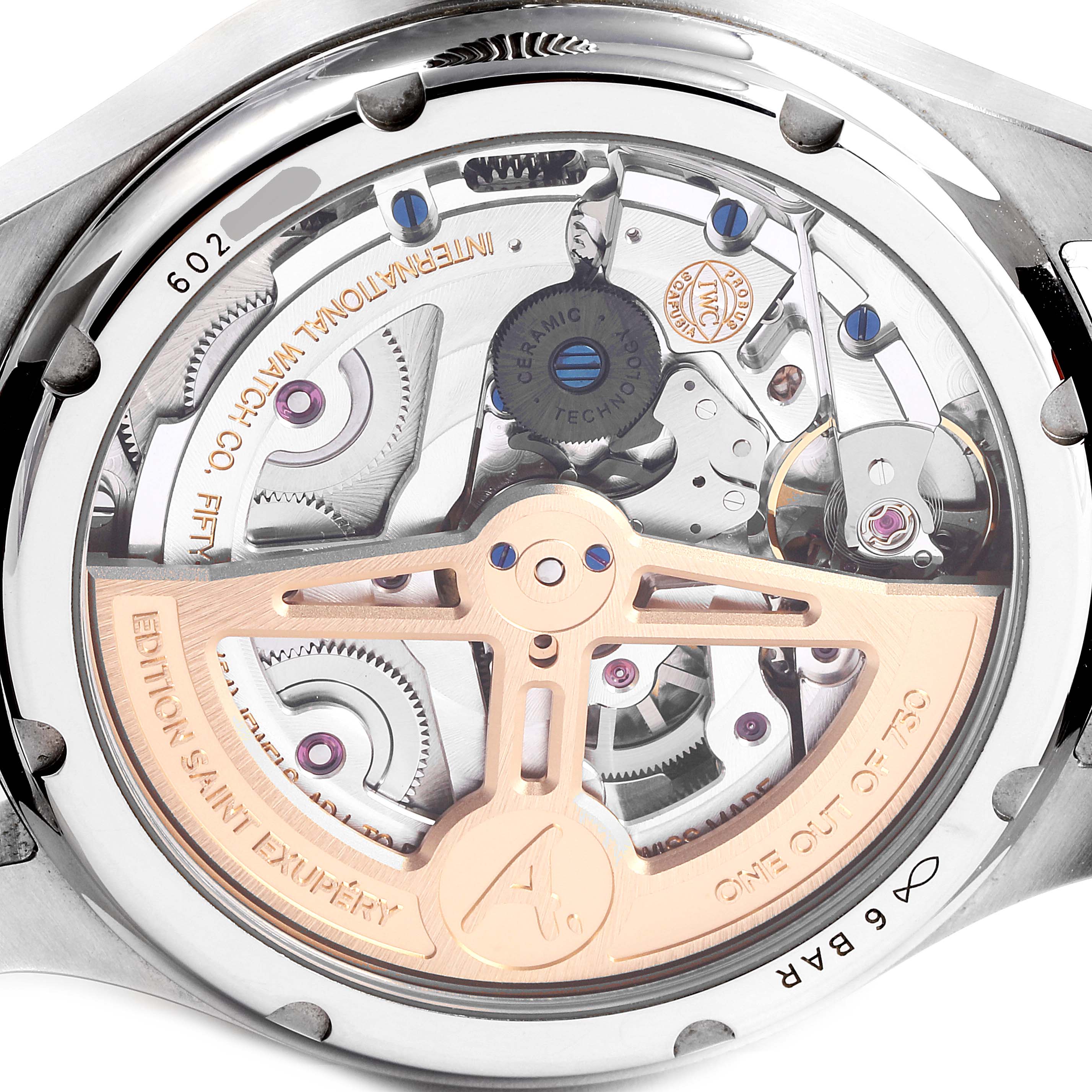 The image shows a close-up of the movement and internal mechanisms of an IWC Pilot IW503801 Men
s Stainless Steel Brown Dial IW503801 Men
s Stainless Steel Brown Dial model watch from the back angle.