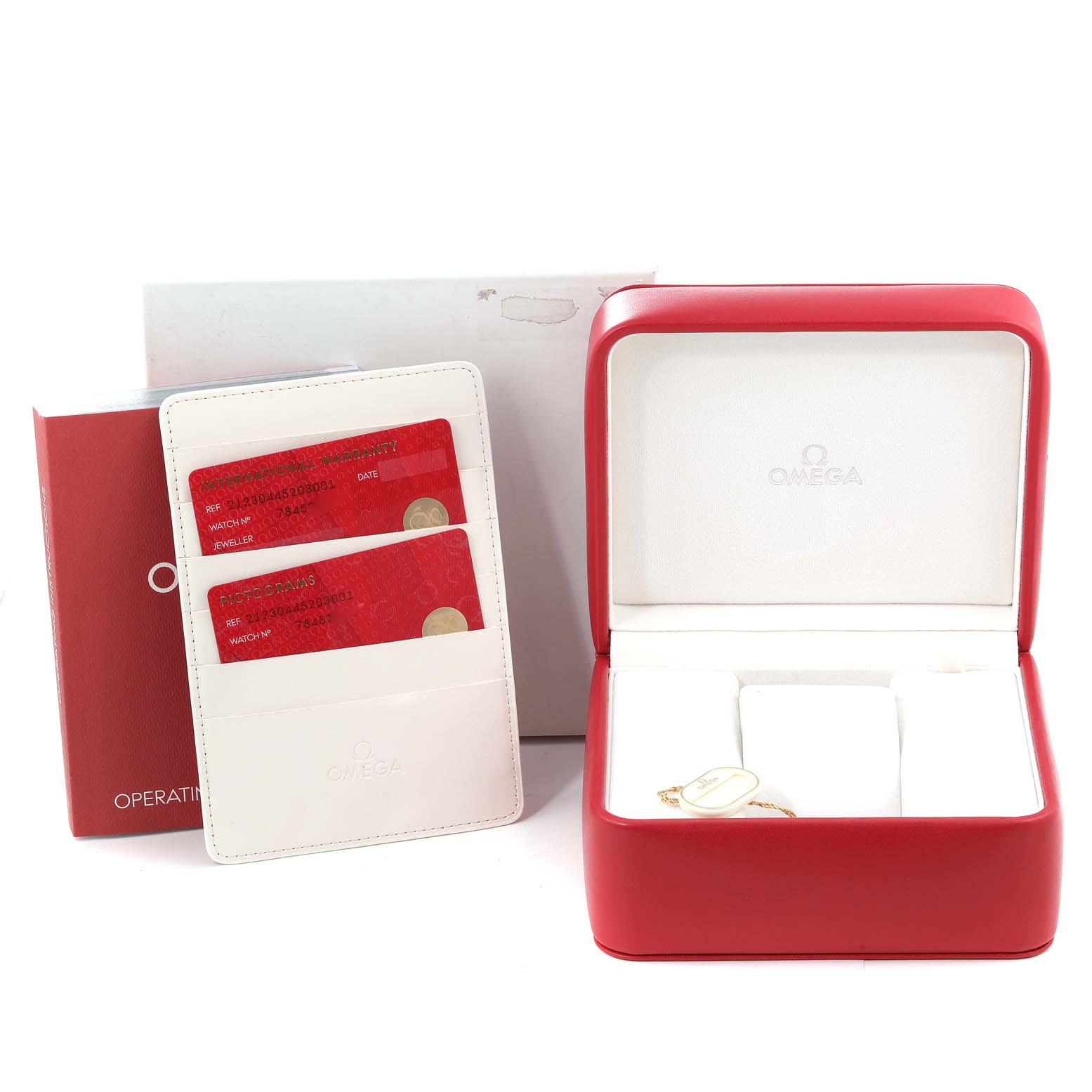 The image depicts the accessories of an Omega Seamaster 212.30.44.52.03.001 Men's Stainless Steel Blue Dial 212.30.44.52.03.001 Men's Stainless Steel Blue Dial, including the watch box, operating instructions, and warranty cards.