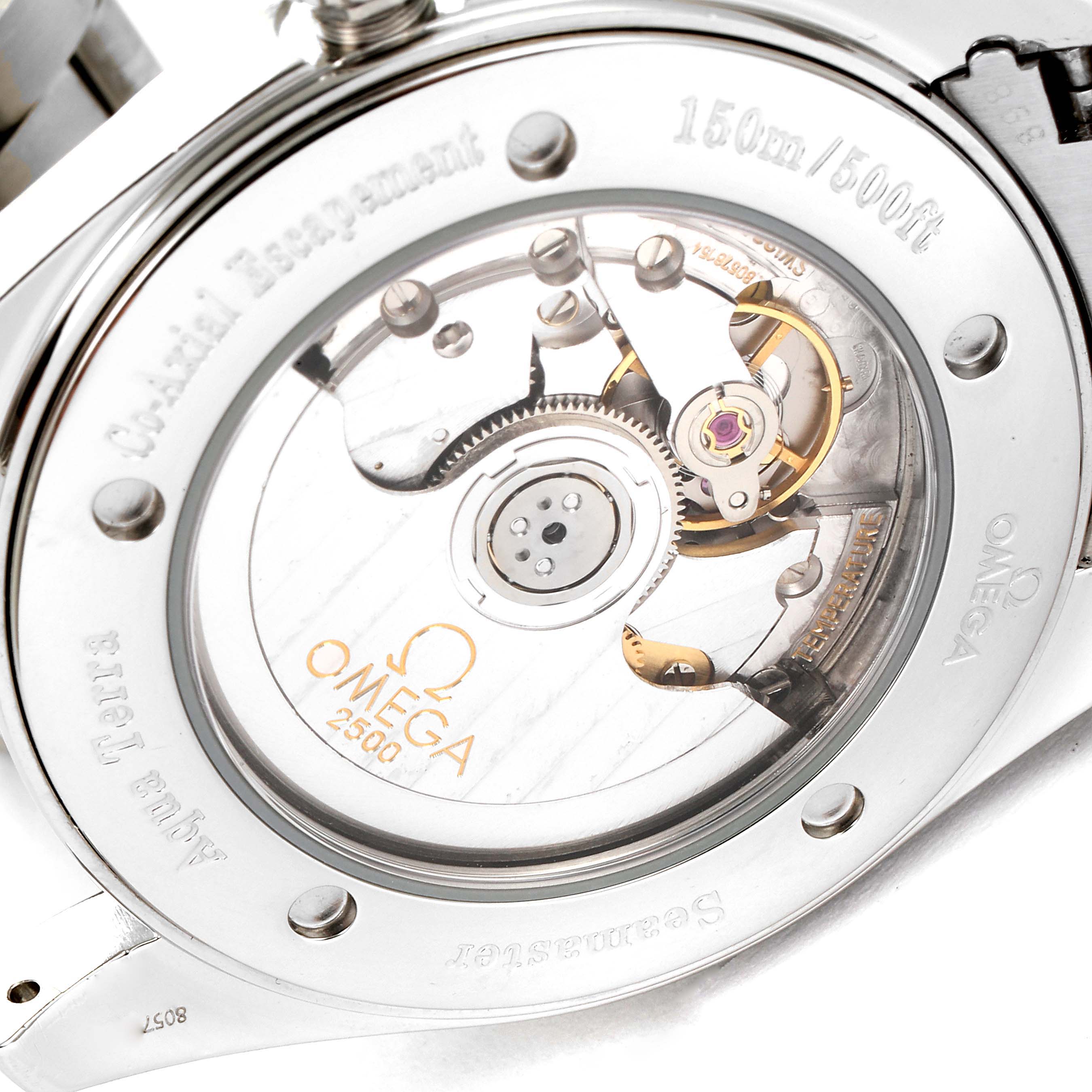 The image shows the open case back of the Omega Aqua Terra 2503.80.00 Men
s Stainless Steel Blue Dial 2503.80.00 Men
s Stainless Steel Blue Dial watch, displaying its intricate movement and co-axial escapement mechanism.