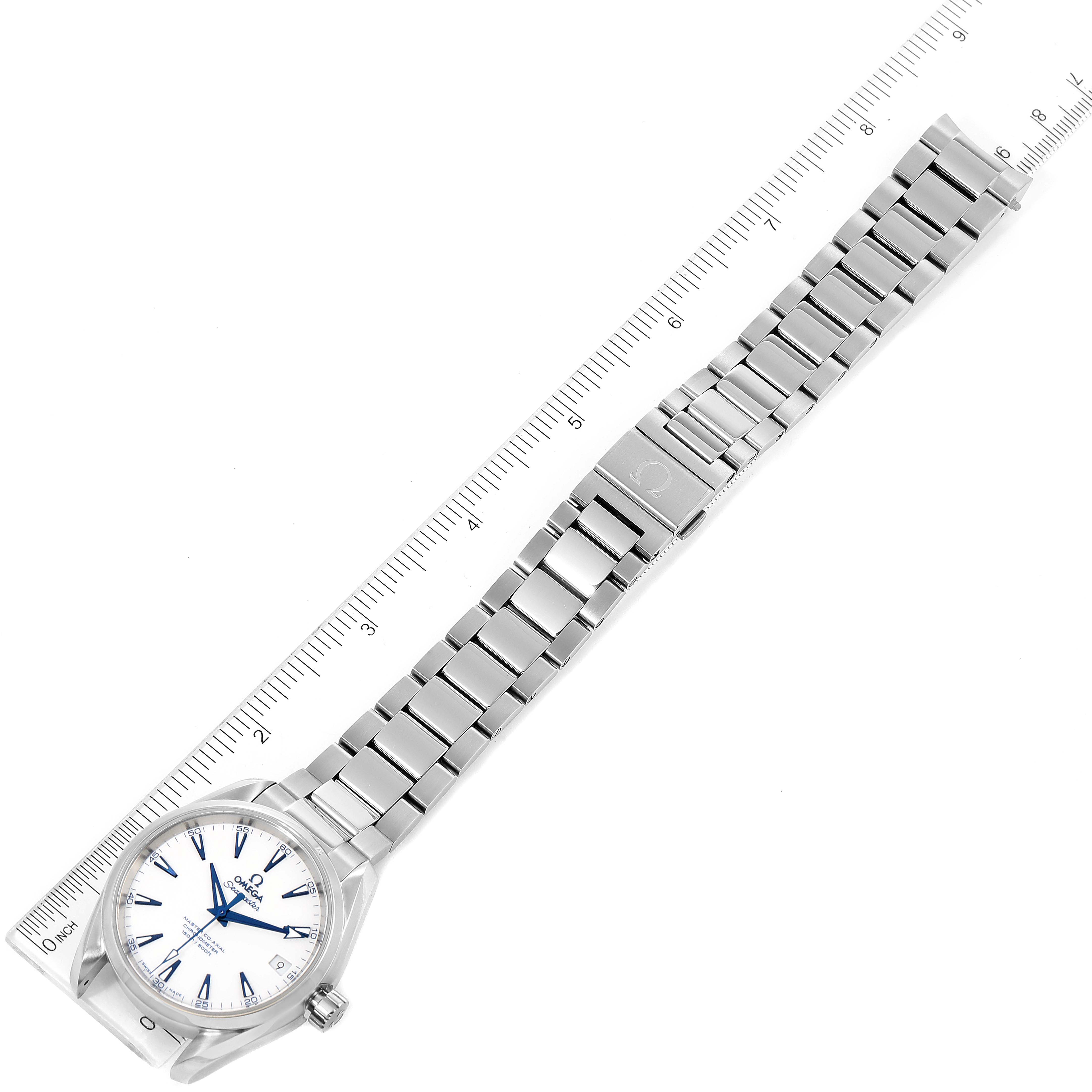 The image shows the Omega Aqua Terra 231.90.39.21.04.001 Men's Titanium White Dial 231.90.39.21.04.001 Men's Titanium White Dial watch placed diagonally, displayed alongside a ruler, highlighting its full bracelet and dial.