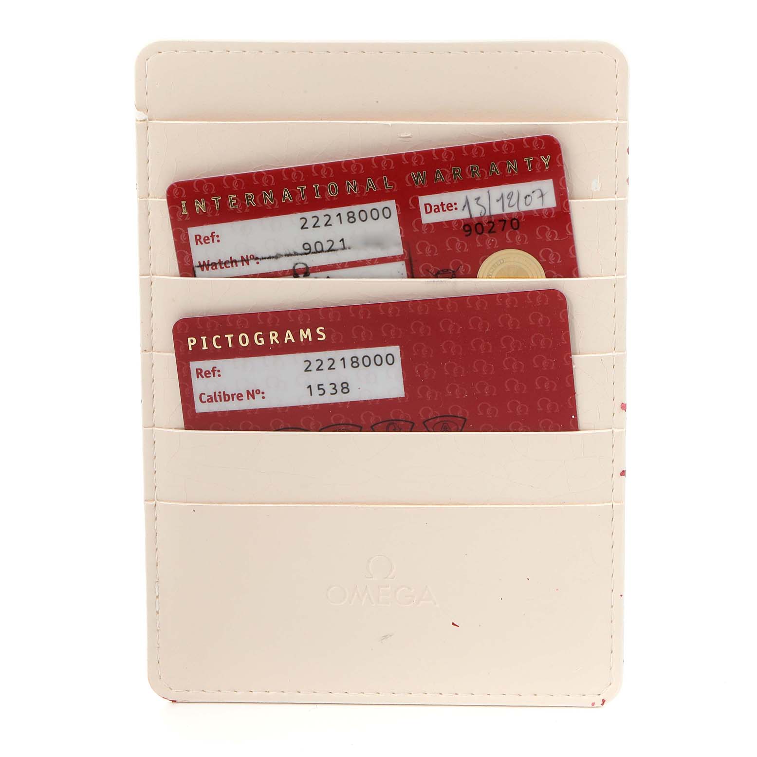 This image shows the warranty and pictogram cards for the Omega Seamaster 2221.80.00 Men's Stainless Steel Blue Dial 2221.80.00 Men's Stainless Steel Blue Dial model in a cream-colored cardholder.