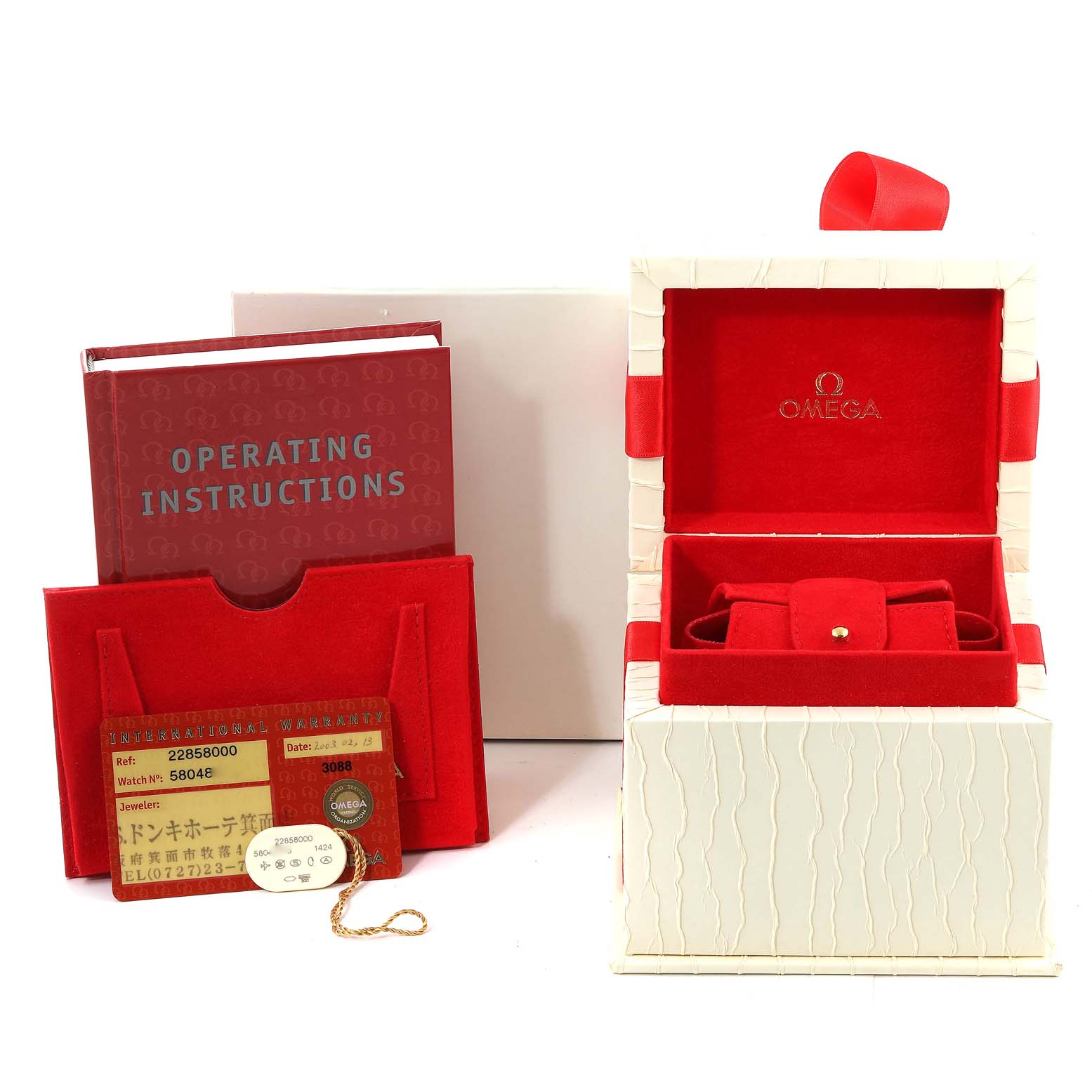 The image shows the box, operating instructions, and warranty card for the Omega 2285.80.00 Women's Stainless Steel Blue Dial 2285.80.00 Women's Stainless Steel Blue Dial Seamaster Diver Quartz 28mm Steel Ladies Watch 2285.80.00.