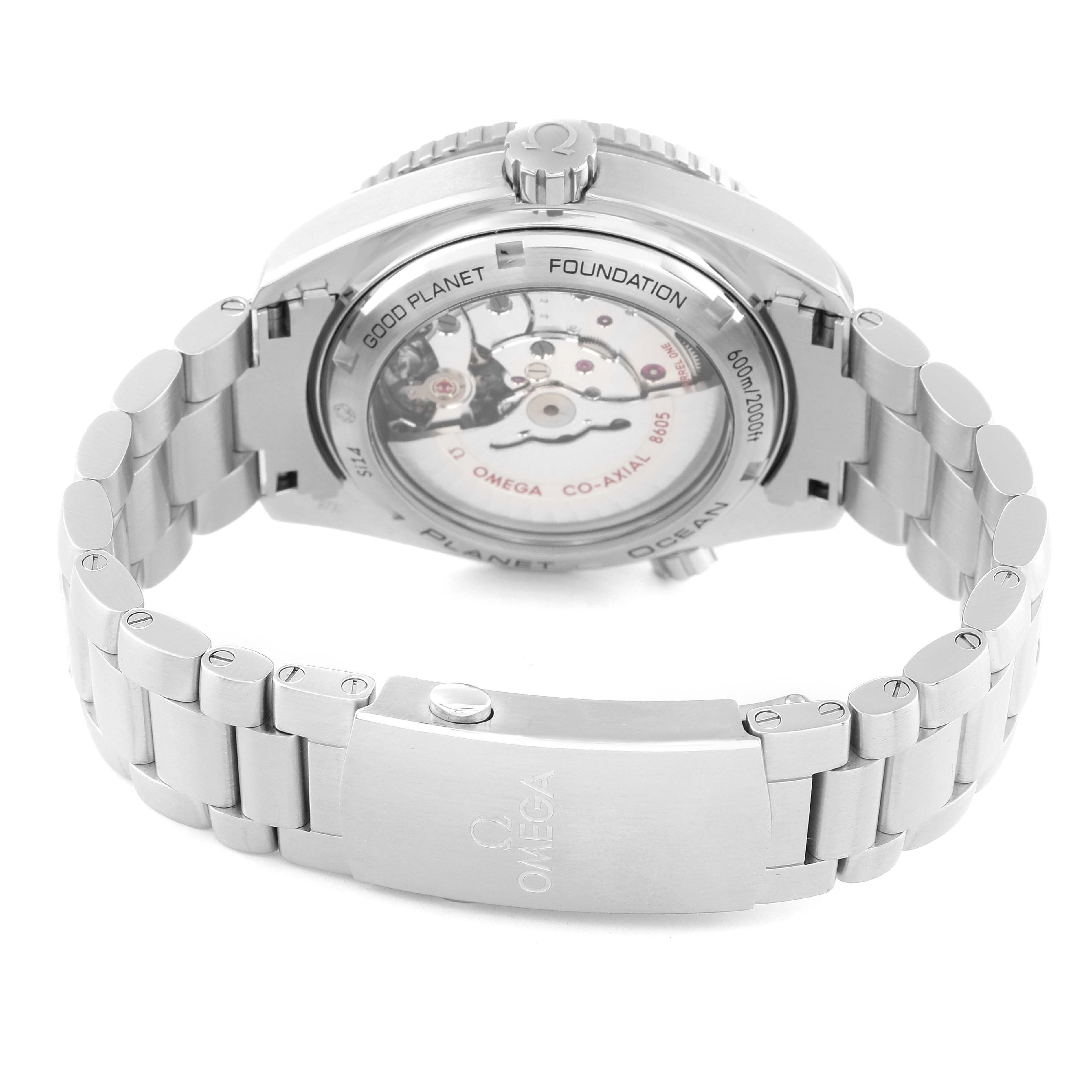 The image shows the back view of an Omega Planet Ocean 232.30.44.22.03.001 Men
s Stainless Steel Blue Dial 232.30.44.22.03.001 Men
s Stainless Steel Blue Dial watch, highlighting the exposed movement and stainless steel bracelet.