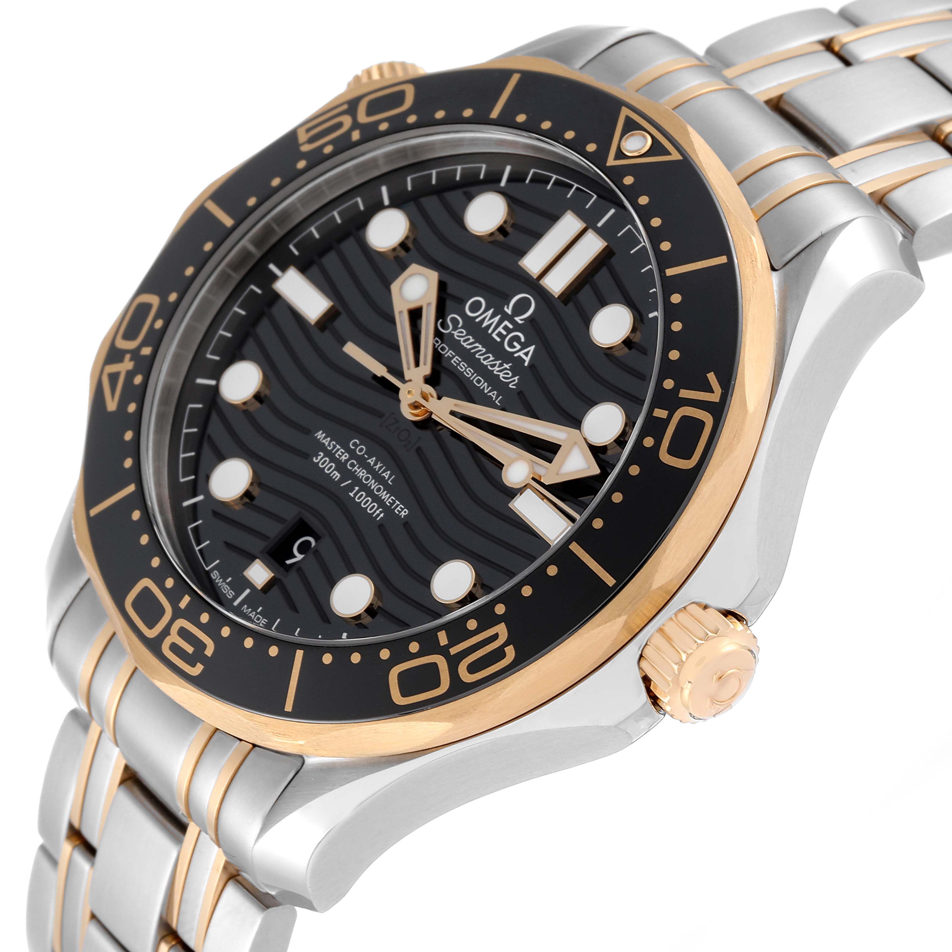 The Omega Seamaster 210.20.42.20.01.002 Men's Steel and Gold (two tone) Black Dial 210.20.42.20.01.002 Men's Steel and Gold (two tone) Black Dial watch is shown from an oblique angle, highlighting its dial, bezel, crown, and part of the bracelet.