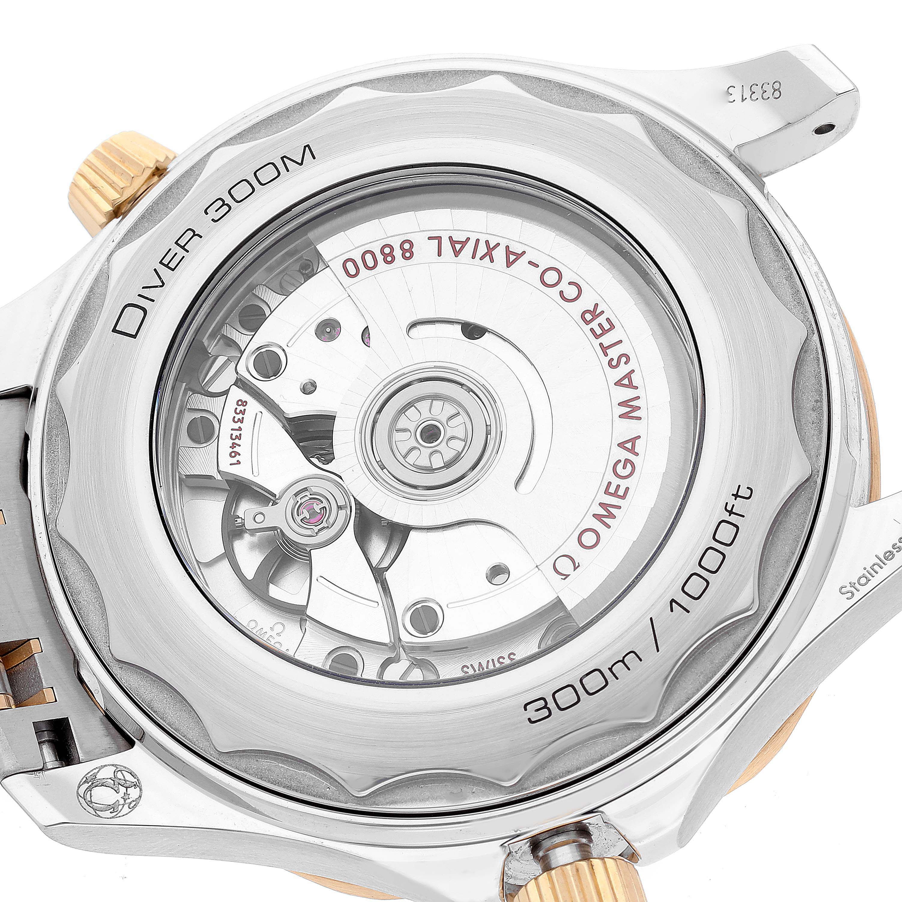 The image shows the back view of the Omega Seamaster 210.20.42.20.01.002 Men's Steel and Gold (two tone) Black Dial 210.20.42.20.01.002 Men's Steel and Gold (two tone) Black Dial watch, highlighting its transparent caseback and internal movement components.