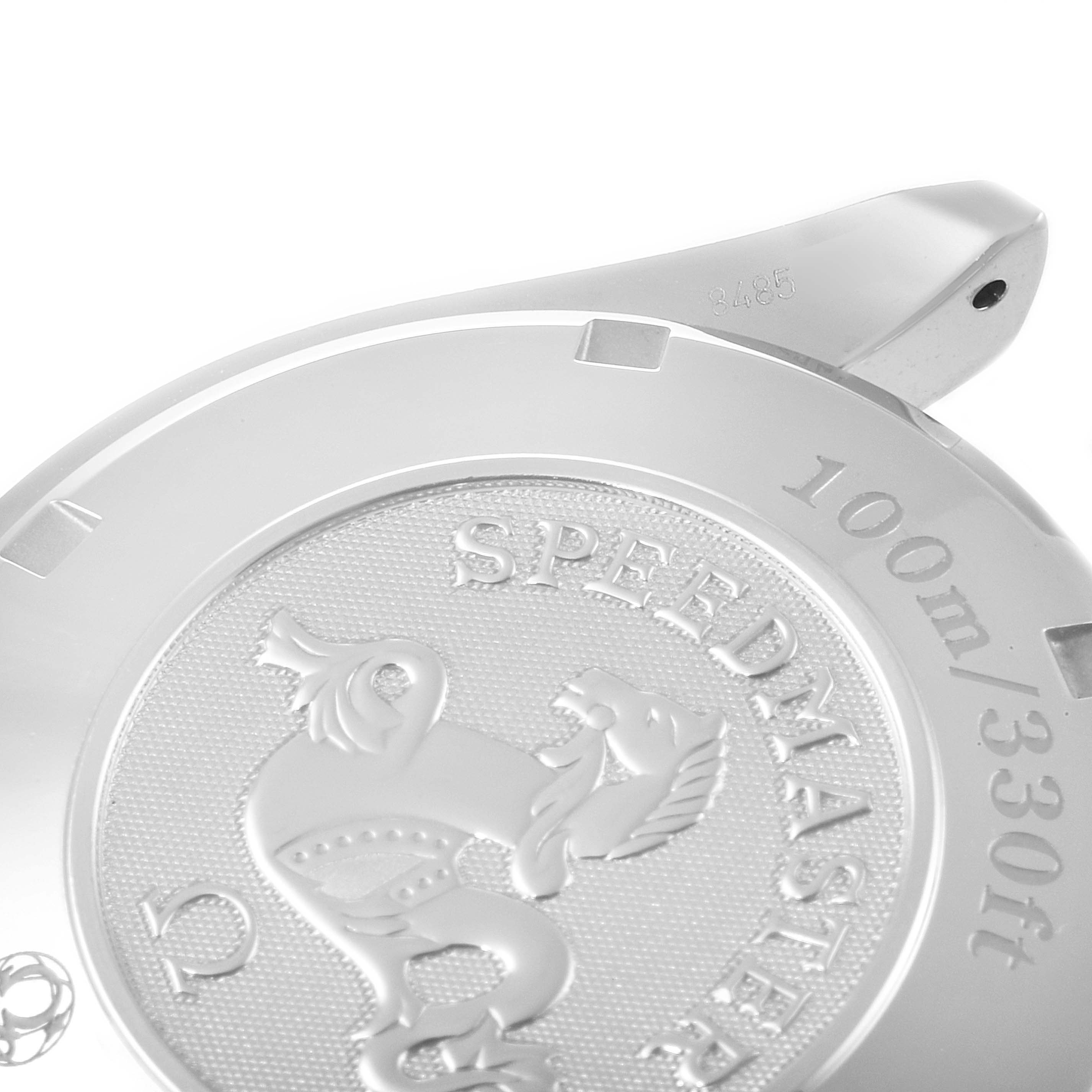 The image shows a close-up of the back casing of an Omega Speedmaster 323.30.40.40.04.001 Men's Stainless Steel White Dial 323.30.40.40.04.001 Men's Stainless Steel White Dial watch.