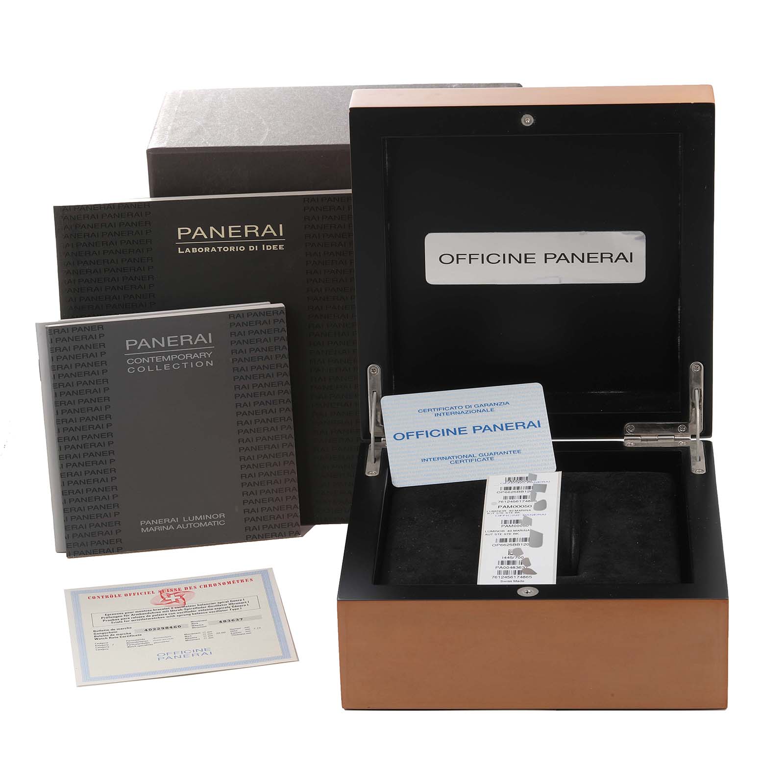 The image shows an open Panerai Luminor PAM00050 Men's Stainless Steel Black Dial PAM00050 Men's Stainless Steel Black Dial watch box with certificates, a manual, and outer packaging.