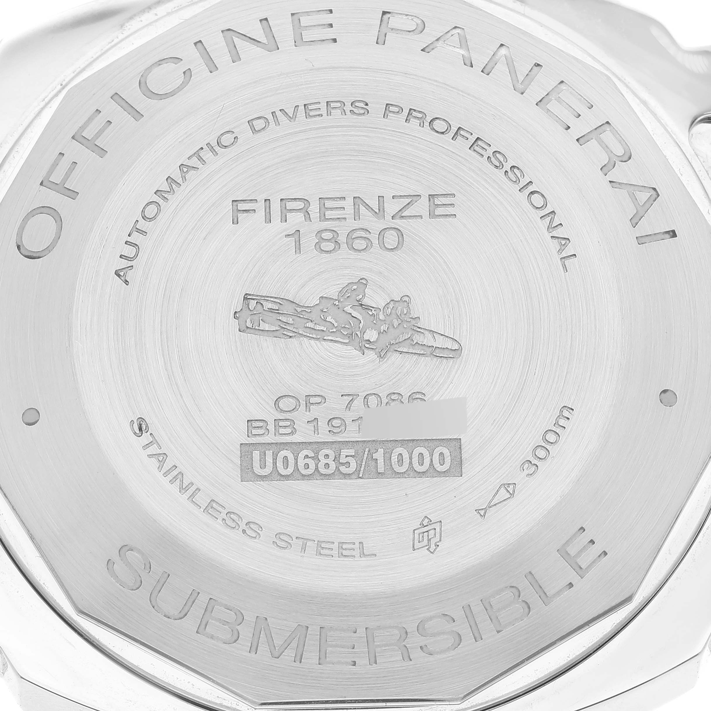 The image shows the back case of a Luminor Submersible model by Panerai, highlighting engravings and specifications.