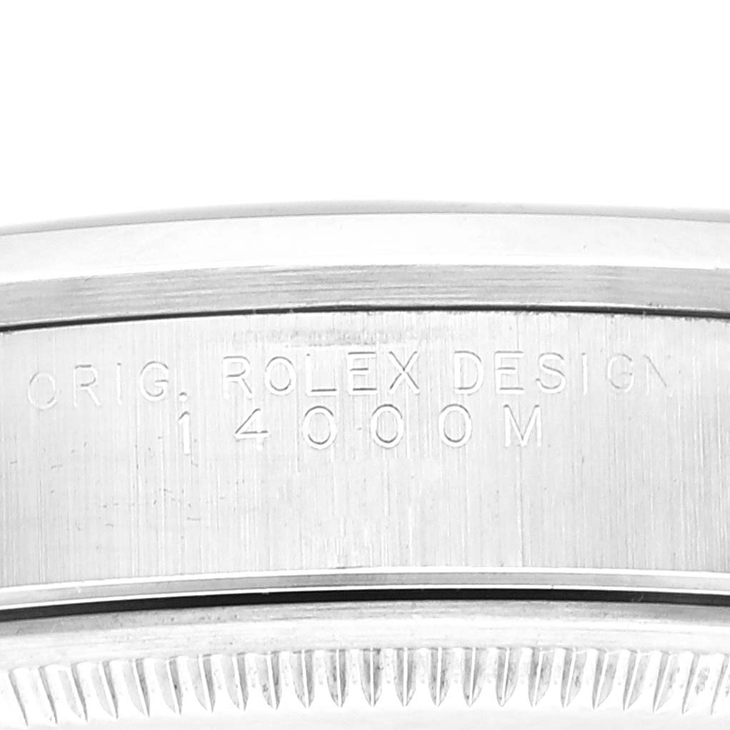 This image shows a close-up of the side of a Rolex Air-King 14000 Men's Stainless Steel Blue Dial 14000 Men's Stainless Steel Blue Dial watch case, featuring the model number engraving "14000M."