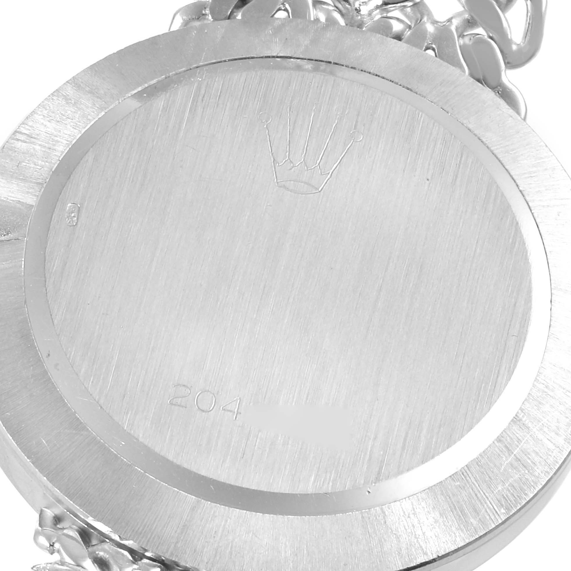 This image shows the engraved case back of a Rolex Cellini 3838 Women's White Gold Silver Dial 3838 Women's White Gold Silver Dial watch from a close-up angle.