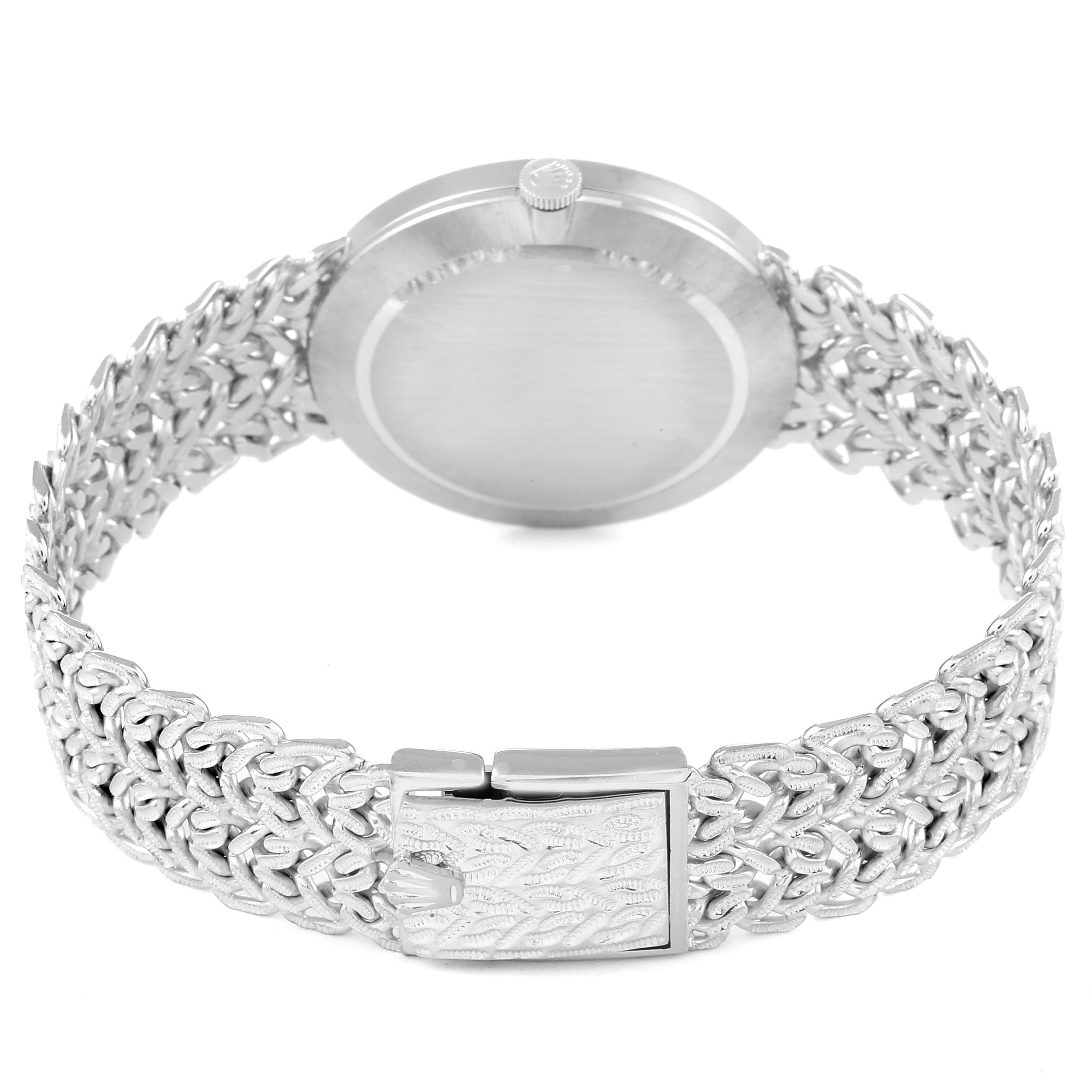 The image shows the back view of a Rolex Cellini 3838 Women's White Gold Silver Dial 3838 Women's White Gold Silver Dial watch, highlighting the clasp and intricate metal bracelet.