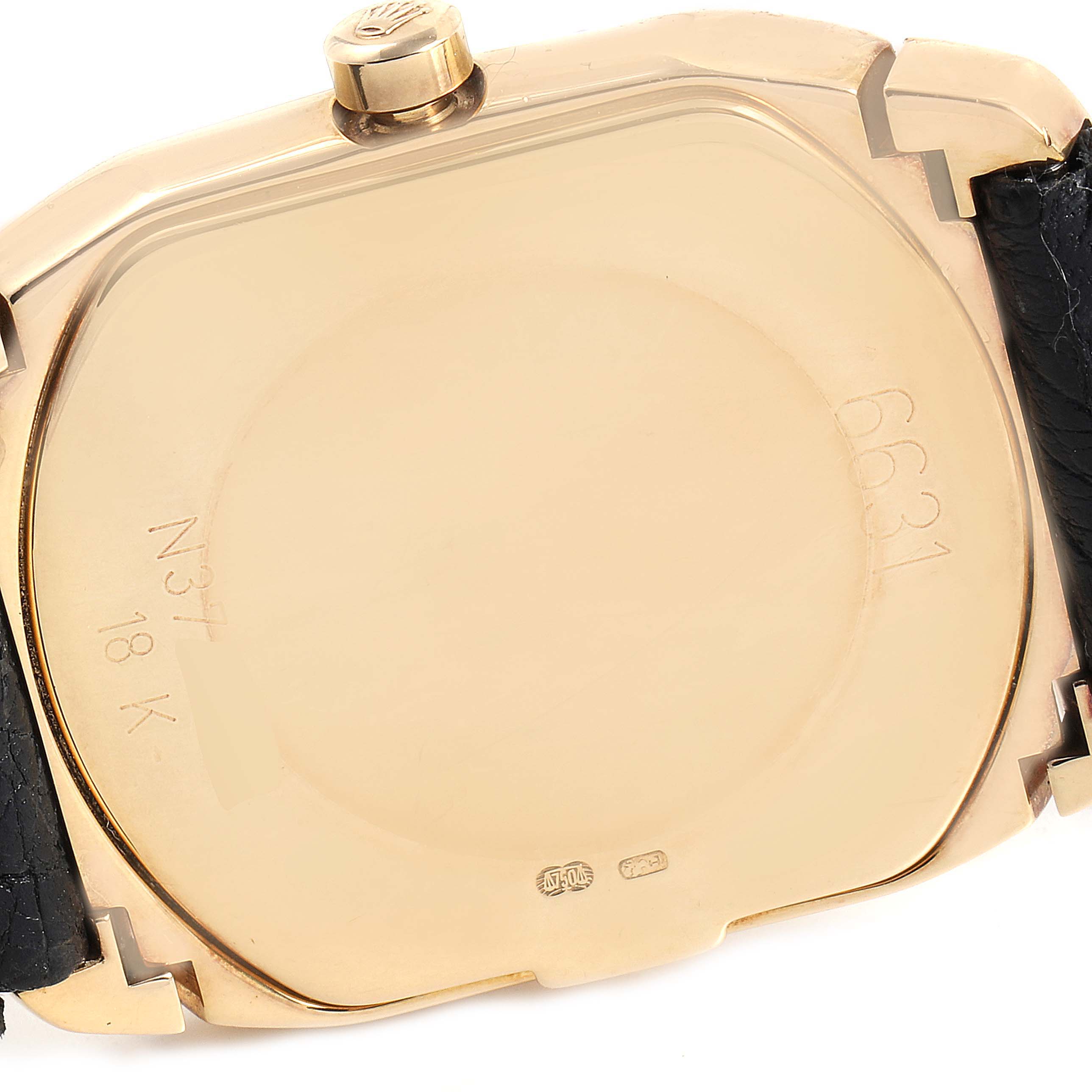 The image shows the back case of a Rolex Cellini 6691 Women's Yellow Gold White Dial 6691 Women's Yellow Gold White Dial watch, including the crown and part of the black leather strap.