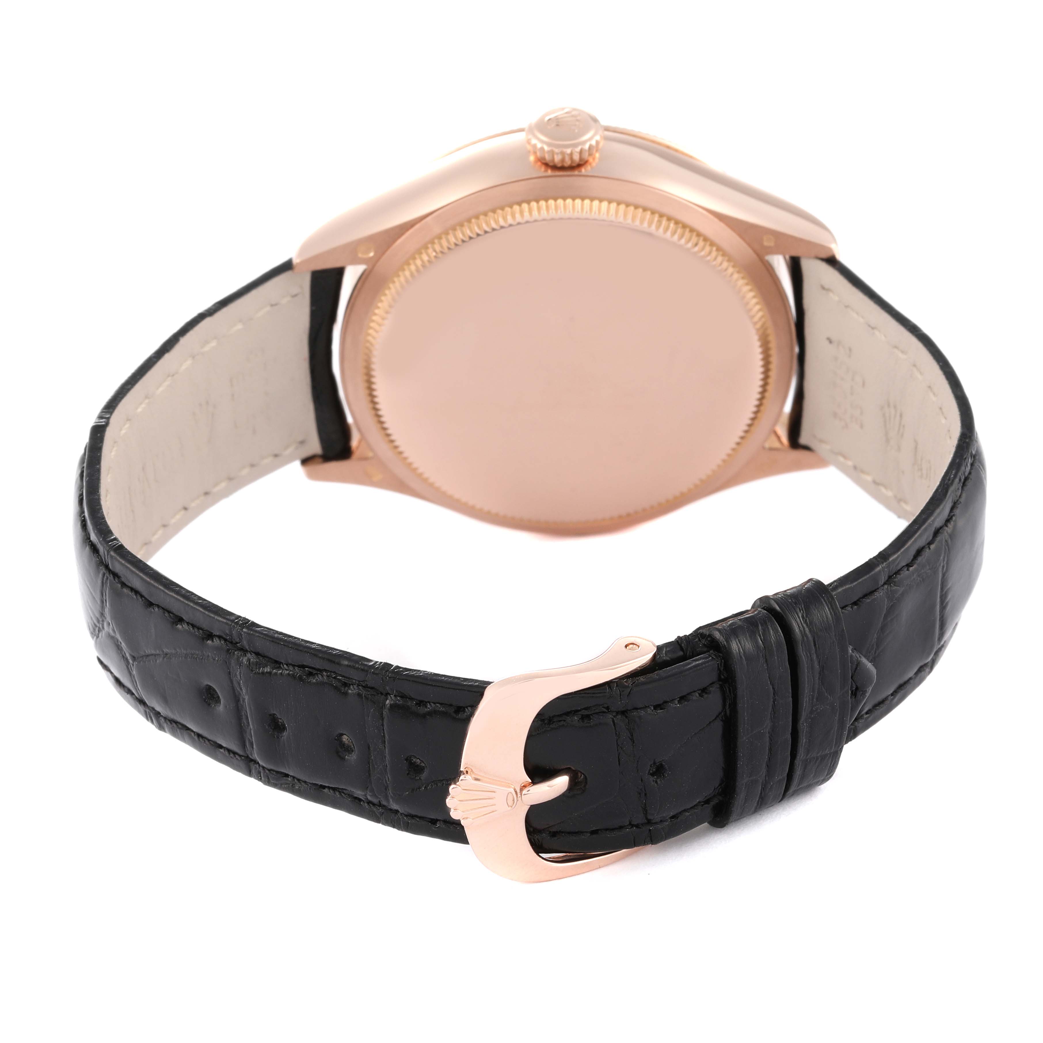 The image shows the back view of a Rolex Cellini 50525 Men's Rose Gold Black Dial 50525 Men's Rose Gold Black Dial model watch, focusing on the case, crown, and black leather strap with a rose gold clasp.