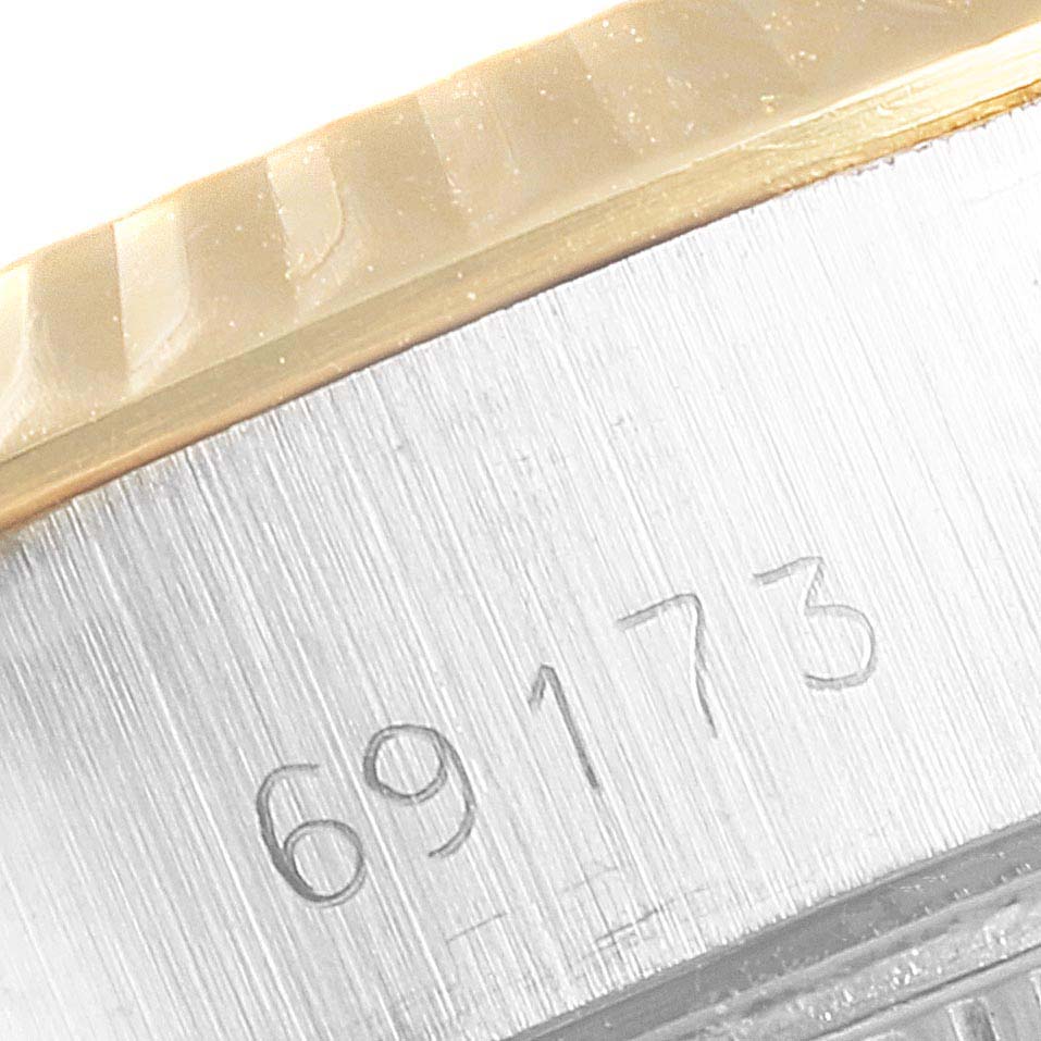 This image shows a close-up of the case side with the model number engraving of the Rolex Datejust 69173 Women's Stainless Steel Champagne Dial 69173 Women's Stainless Steel Champagne Dial.