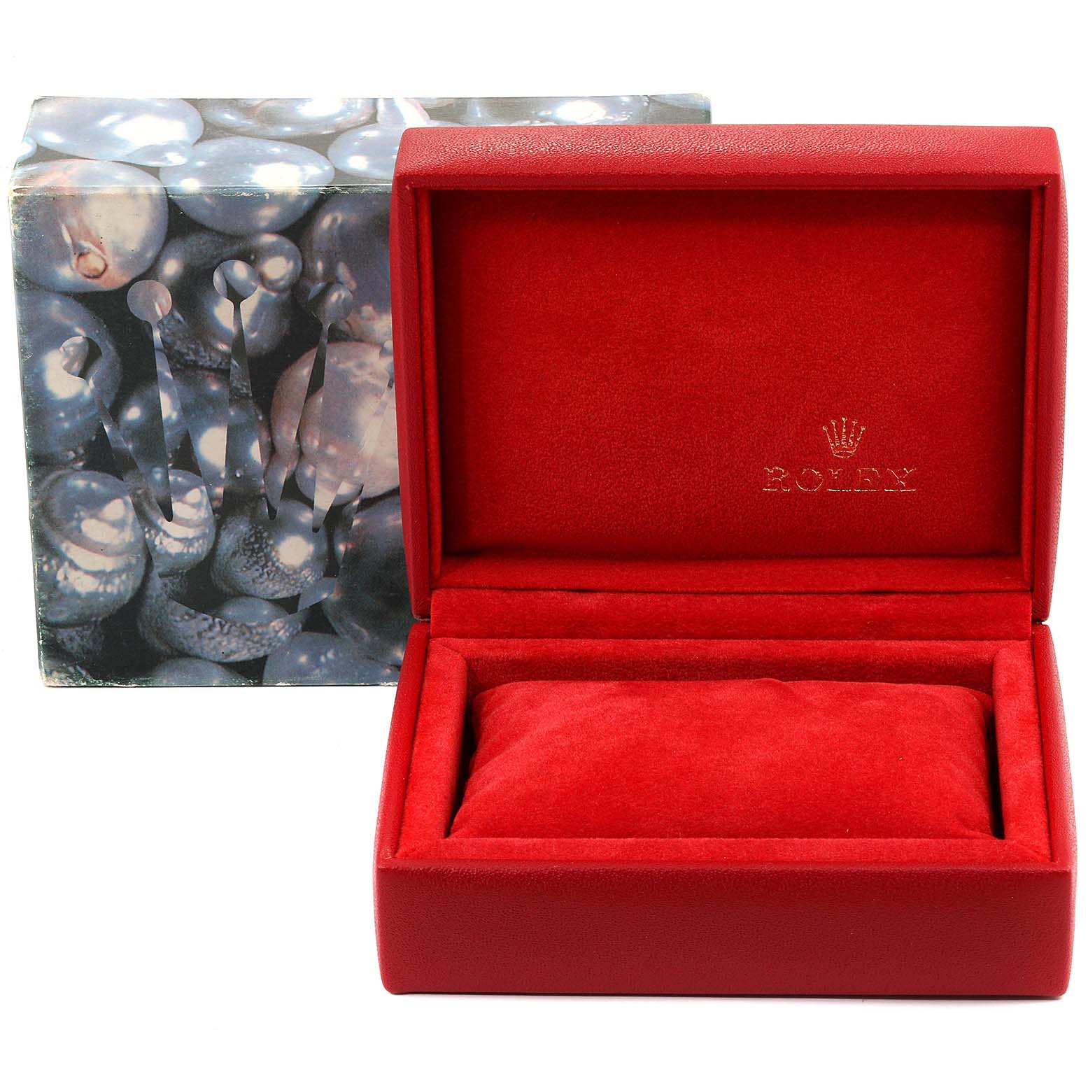 This image shows an open red Rolex Datejust 69173 Women's Stainless Steel Champagne Dial 69173 Women's Stainless Steel Champagne Dial watch box and its outer packaging at a frontal angle.