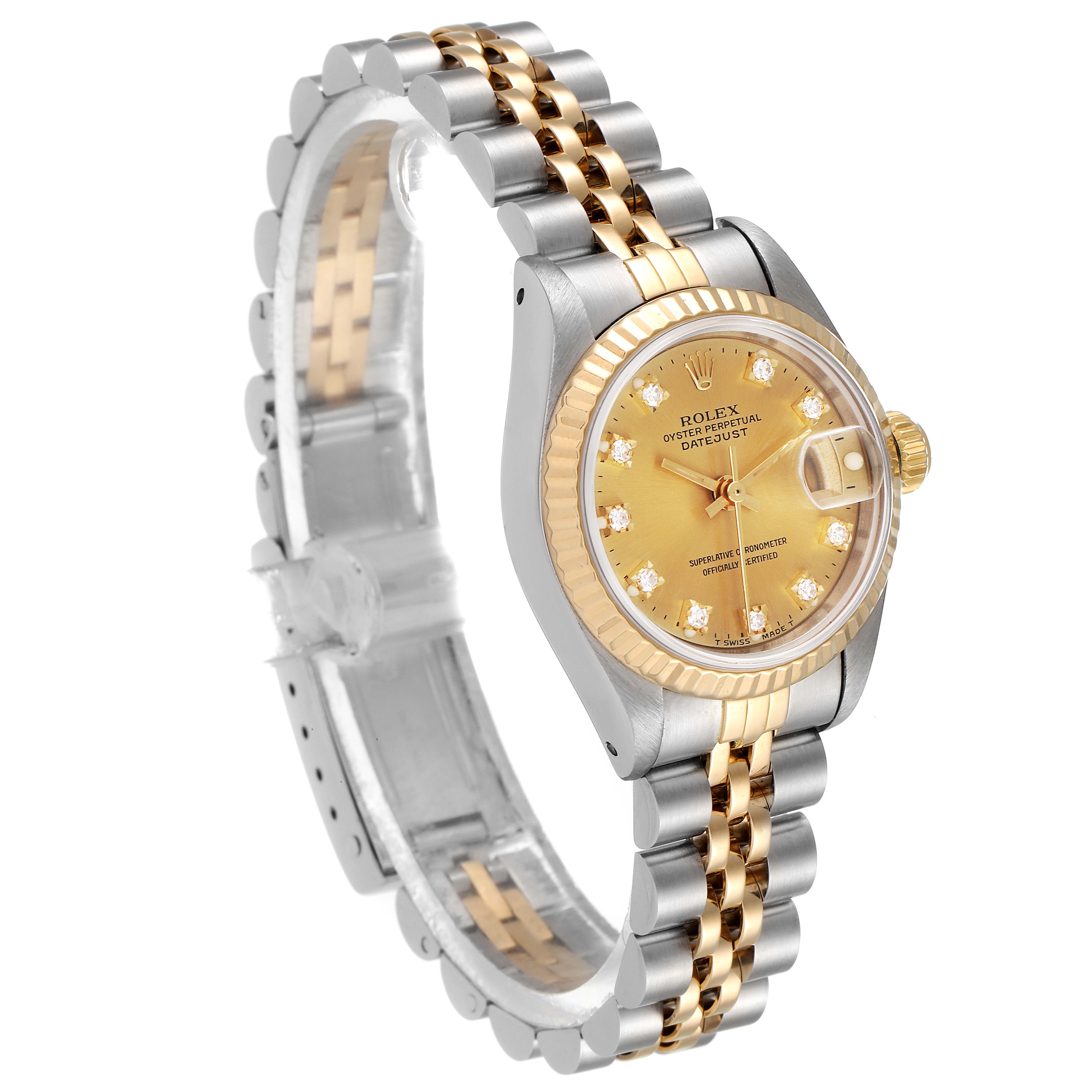 The image shows a Rolex Datejust 69173 Women's Steel and Gold (two tone) Champagne Dial 69173 Women's Steel and Gold (two tone) Champagne Dial watch at a three-quarter angled view, highlighting its face, bezel, and two-tone bracelet.