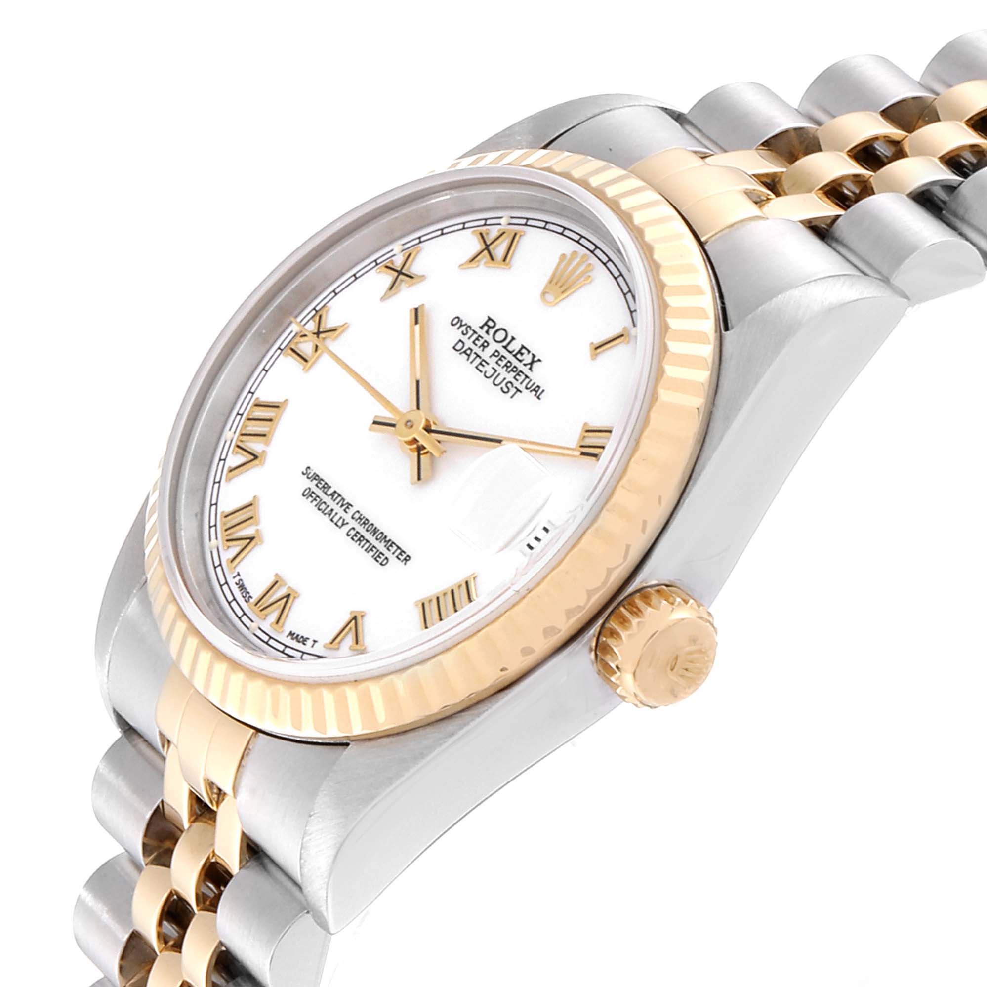 The image shows a Rolex Mid-Size 68273 Women's Steel and Gold (two tone) White Dial 68273 Women's Steel and Gold (two tone) White Dial Oyster Perpetual Datejust, viewed at an angled side profile, highlighting the face, bezel, and bracelet links.