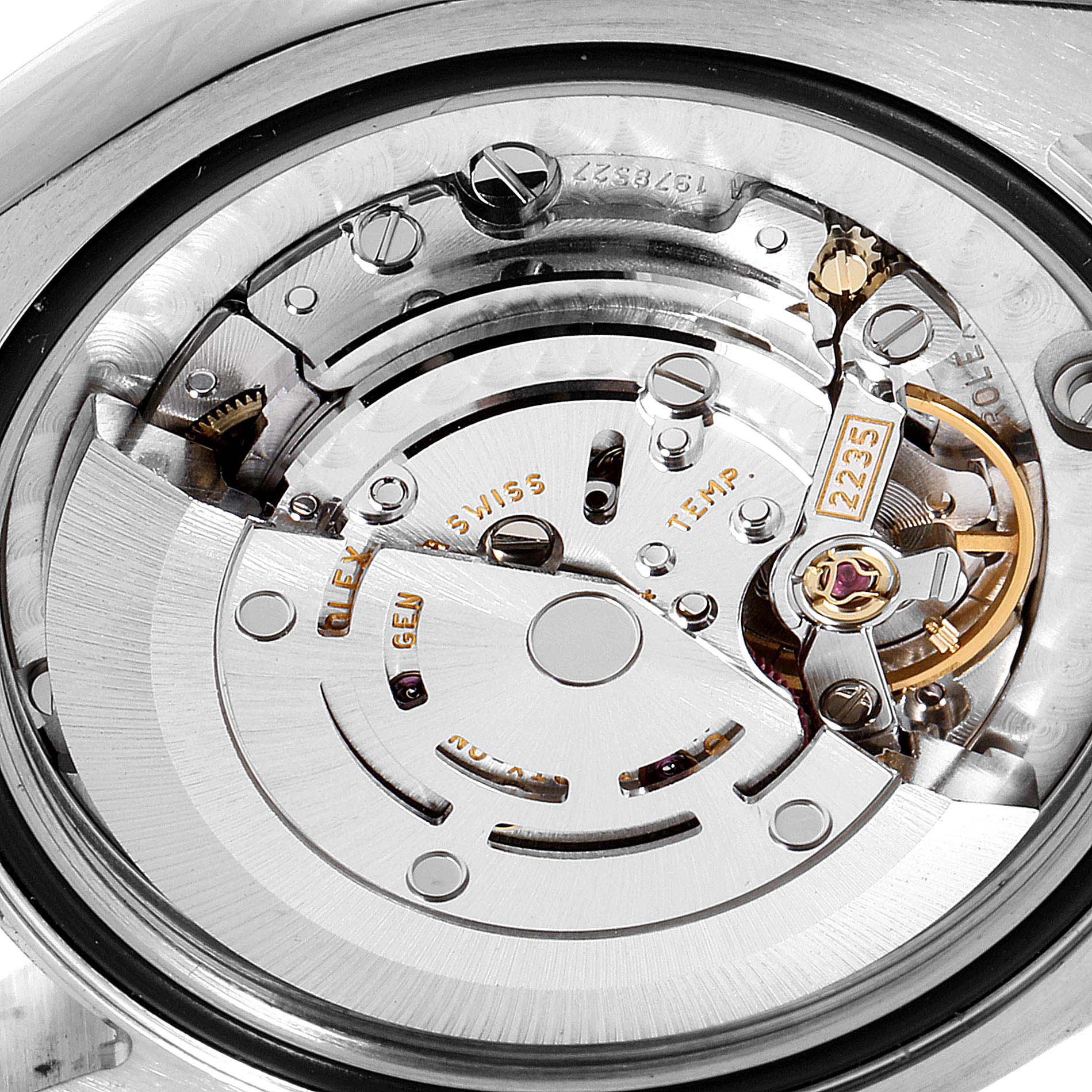 This image shows the intricate internal movement mechanism of a Mid-Size Rolex watch, viewed from a close-up top angle.
