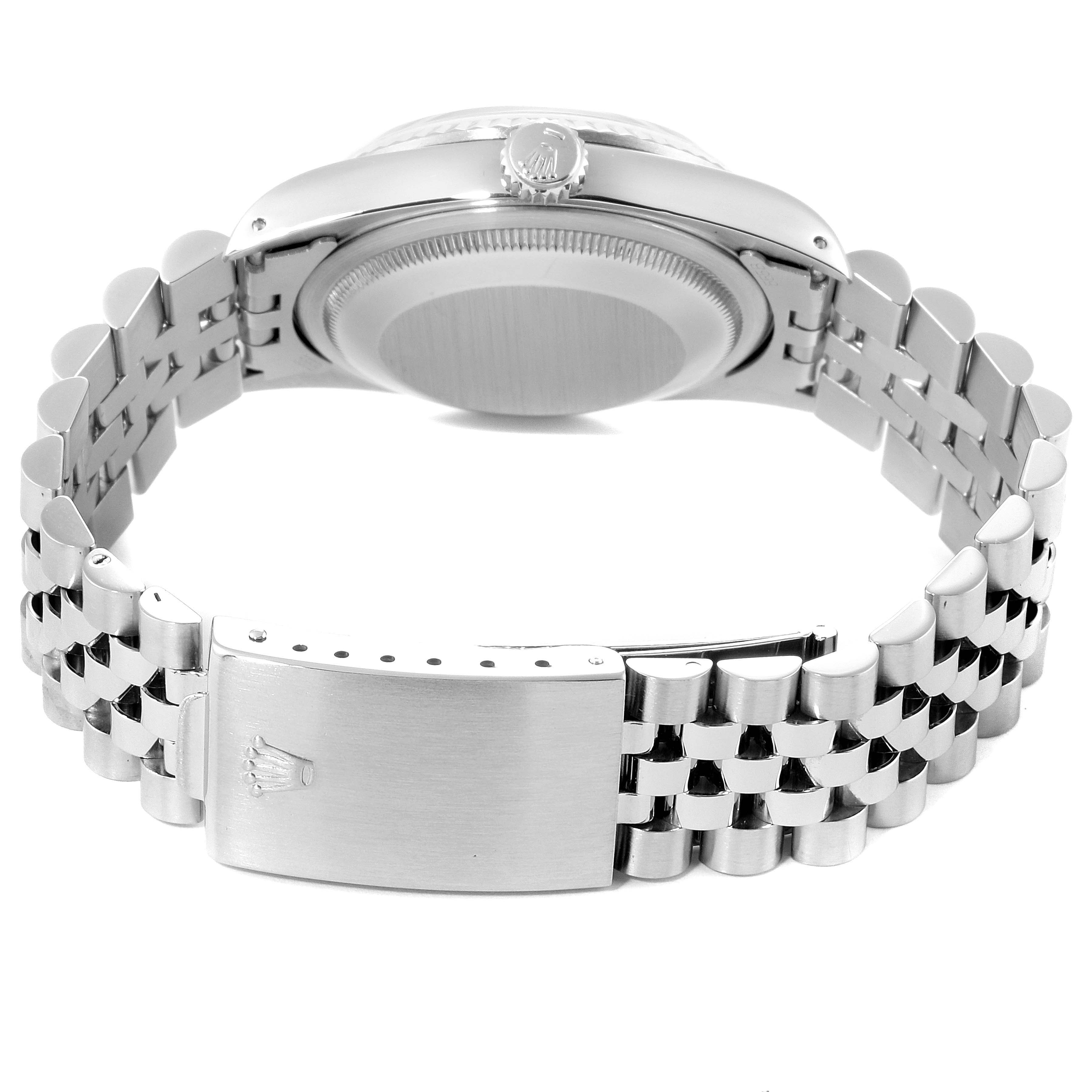 The image shows the back view of a Rolex Datejust 16234 Men's Stainless Steel Silver Dial 16234 Men's Stainless Steel Silver Dial watch focused on the case back, crown, and Jubilee bracelet with clasp.