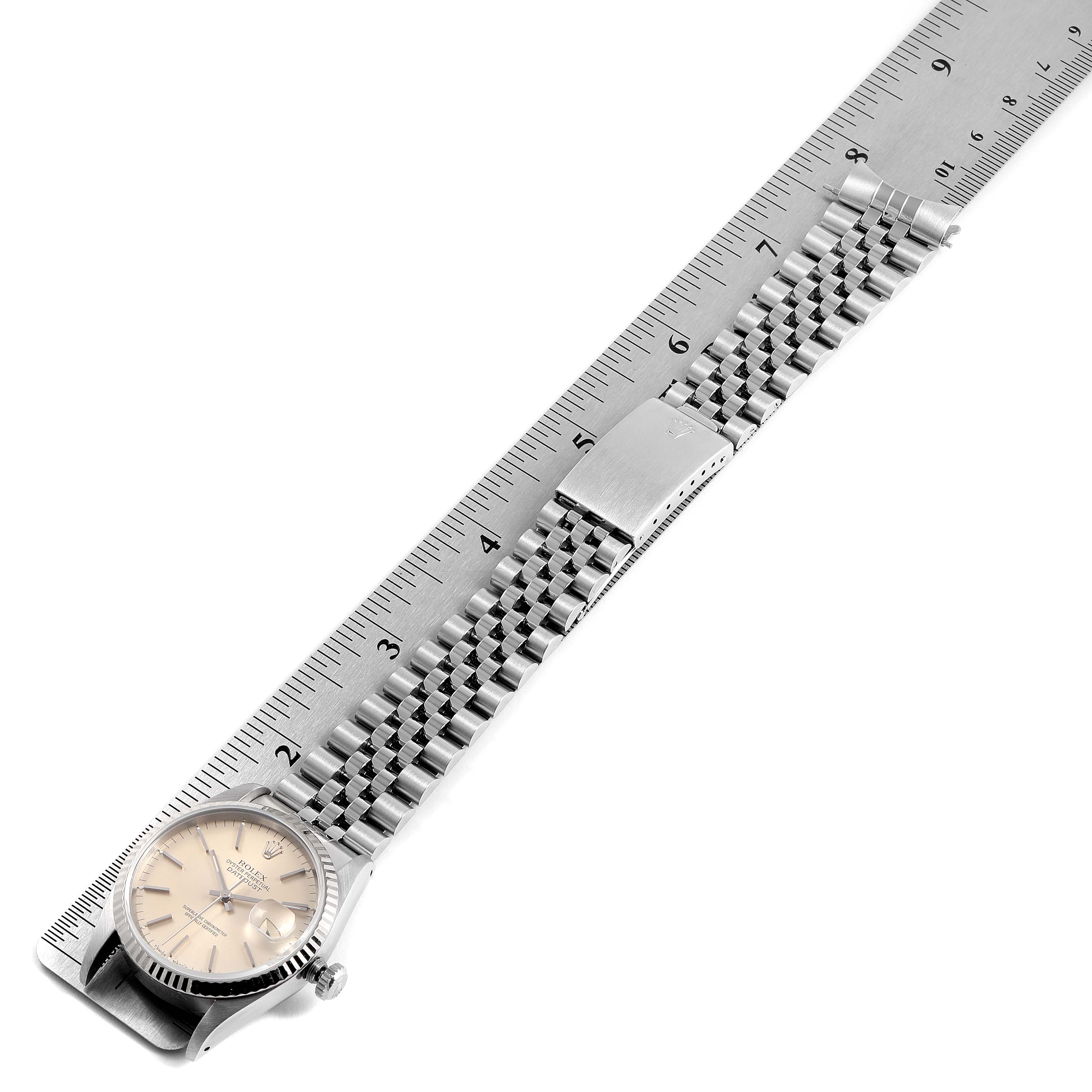 The Rolex Datejust 16234 Men's Stainless Steel Silver Dial 16234 Men's Stainless Steel Silver Dial watch is shown from a top-down angle, displaying the dial, bezel, crown, bracelet, and deployment clasp.