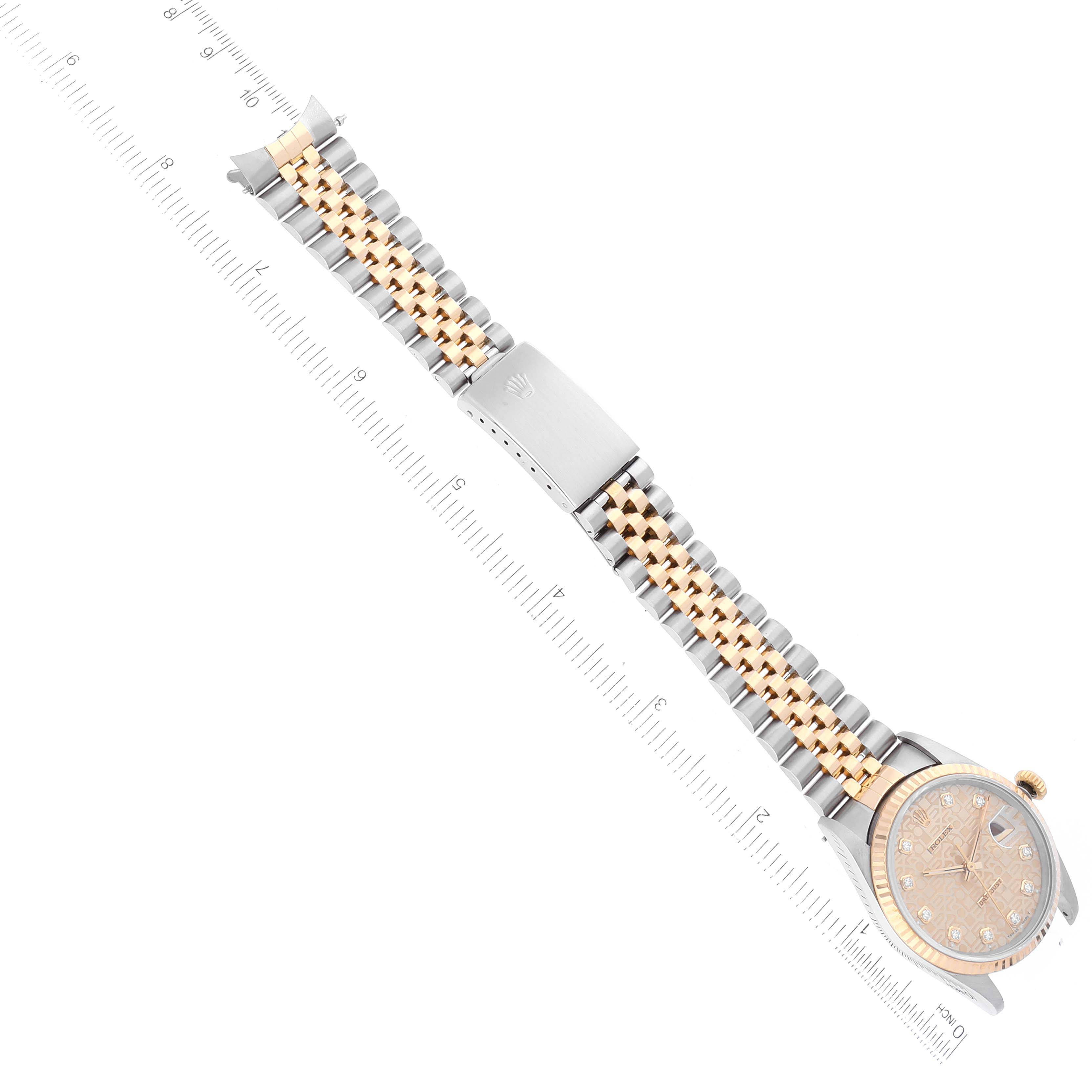 The image shows a top-down view of a Rolex Datejust 16233 Men's Steel and Gold (two tone) Champagne Dial 16233 Men's Steel and Gold (two tone) Champagne Dial watch, including the face, bezel, and bracelet with a ruler for scale.