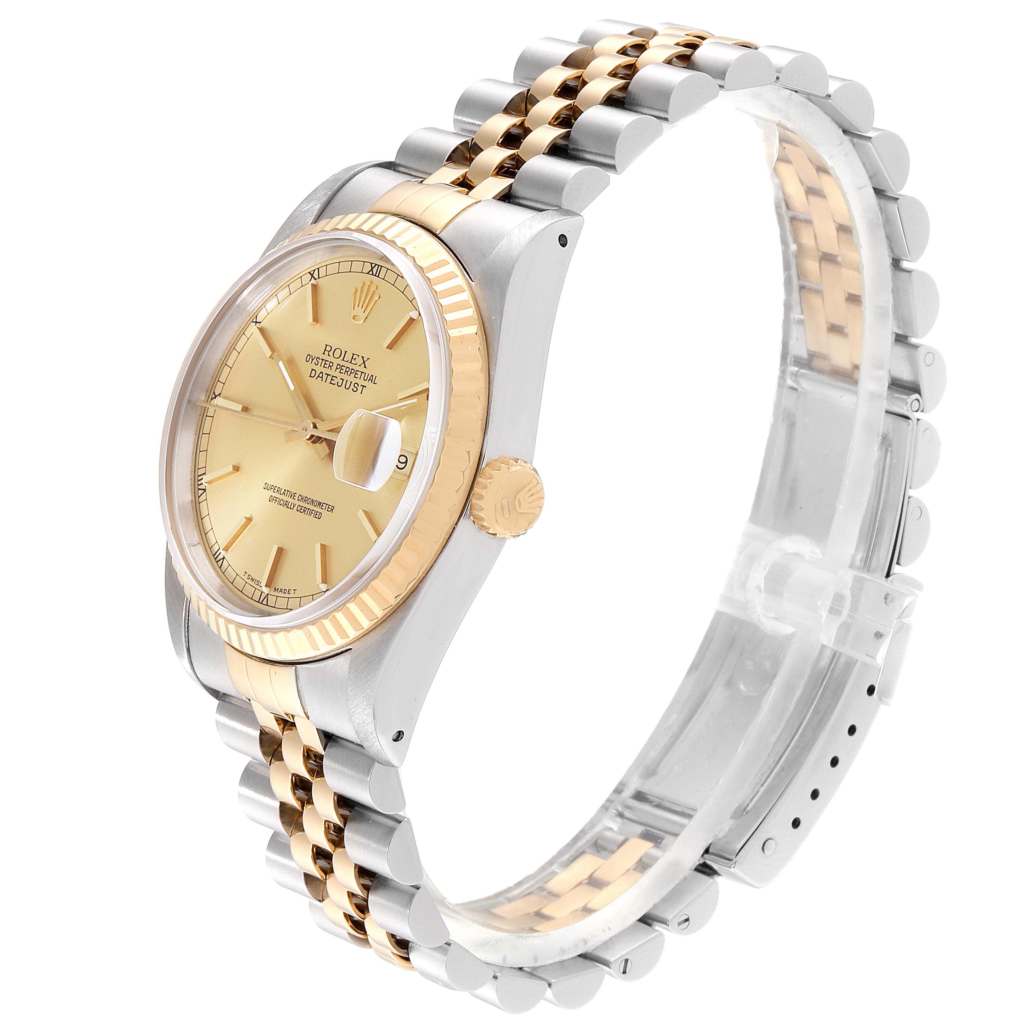 The image shows a side view of a Rolex Datejust 16233 Men's Steel and Gold (two tone) Champagne Dial 16233 Men's Steel and Gold (two tone) Champagne Dial watch, featuring a gold dial, fluted bezel, and a two-tone Jubilee bracelet.