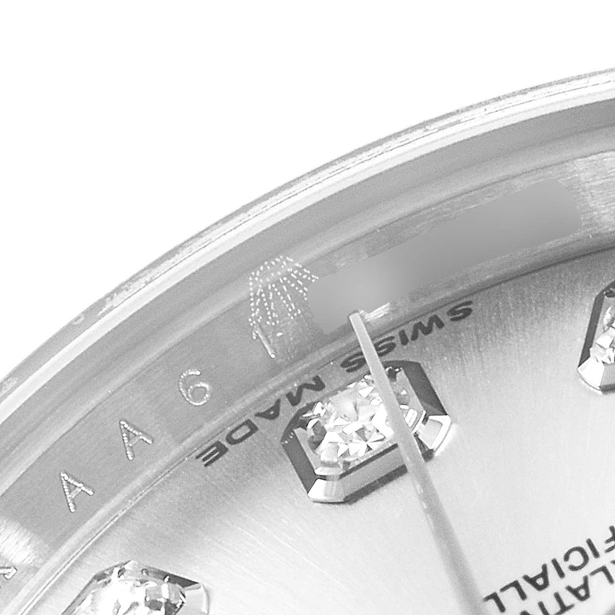 This close-up angle of the Rolex Datejust 179174  Women's Stainless Steel Silver Dial 179174  Women's Stainless Steel Silver Dial watch focuses on the dial, showing "Swiss Made" and diamond hour markers.
