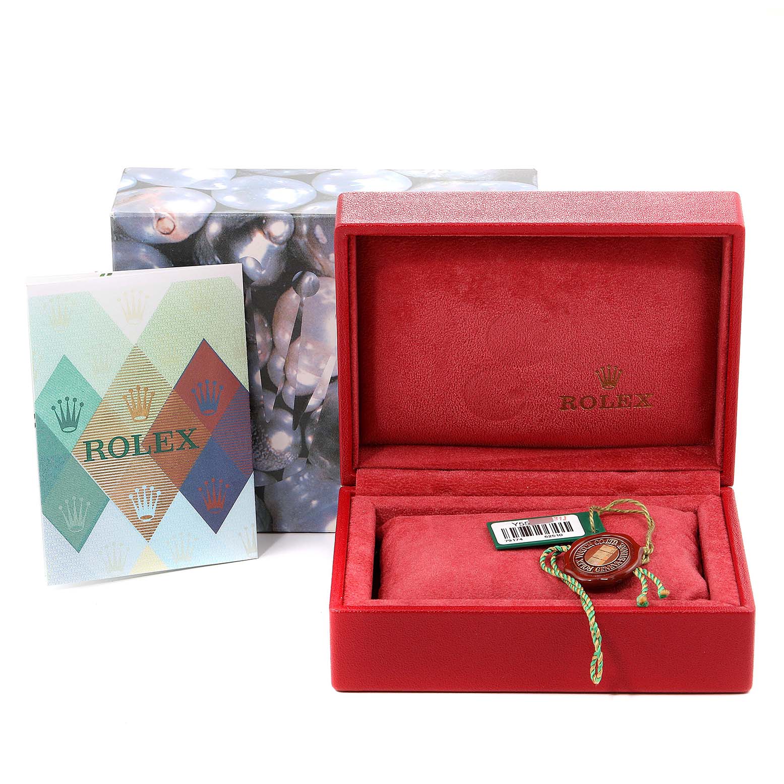 The image shows the packaging and accessories for a Rolex Datejust 79174 Women's Stainless Steel Silver Dial 79174 Women's Stainless Steel Silver Dial watch, including a red box, booklet, and a tag.