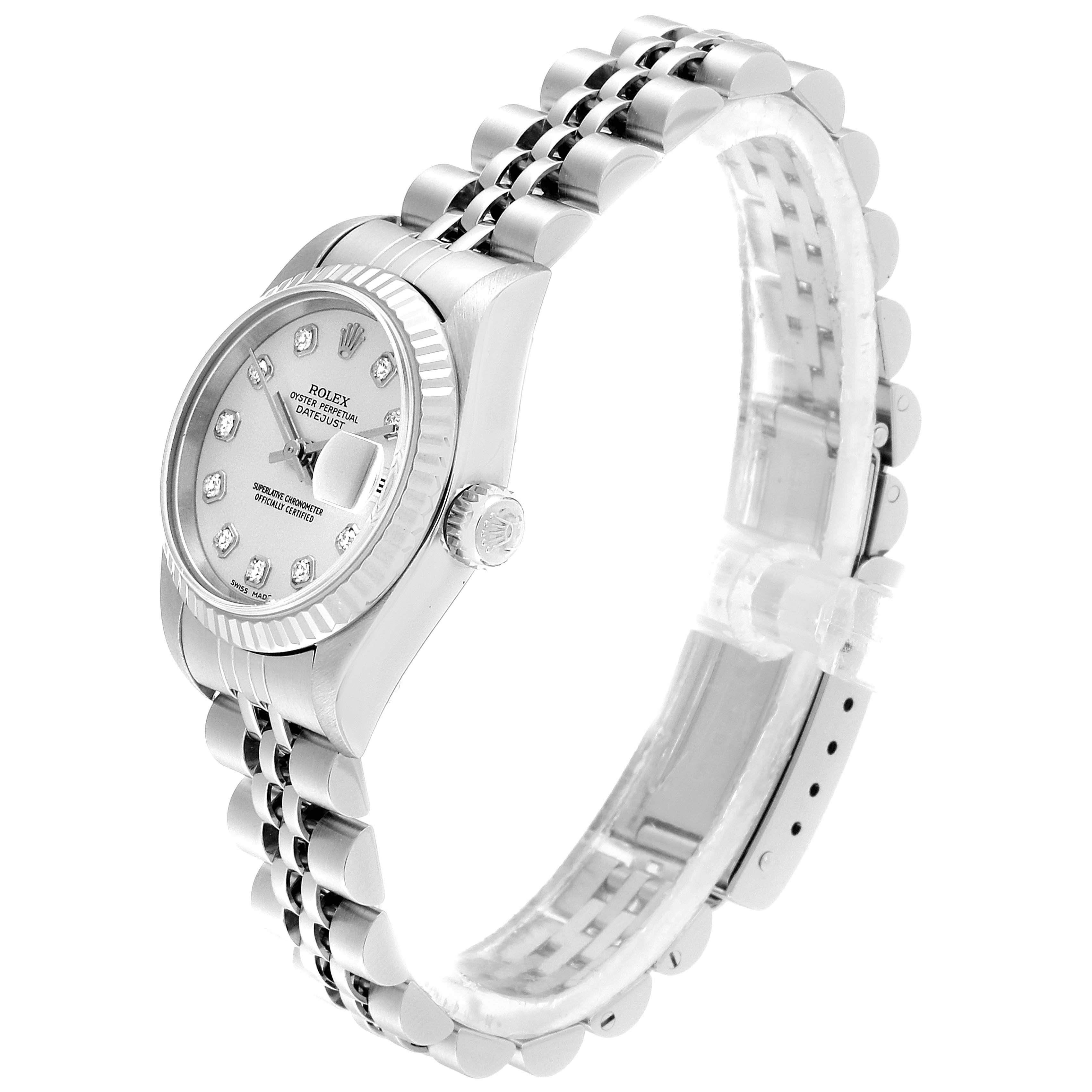 This image shows a side angle of a Rolex Datejust 79174 Women's Stainless Steel Silver Dial 79174 Women's Stainless Steel Silver Dial watch displaying the dial, fluted bezel, and Jubilee bracelet.