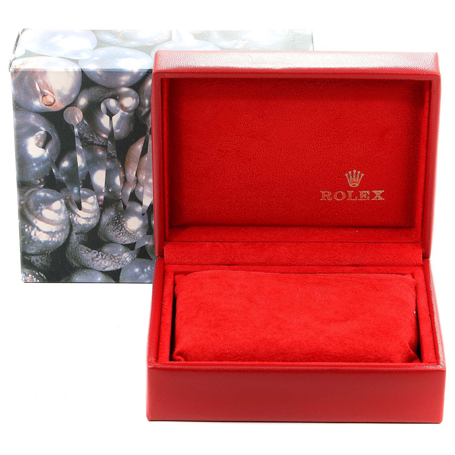 This image shows an open red box for a Datejust model by Rolex, displaying the interior lining and the cushion for holding the watch.